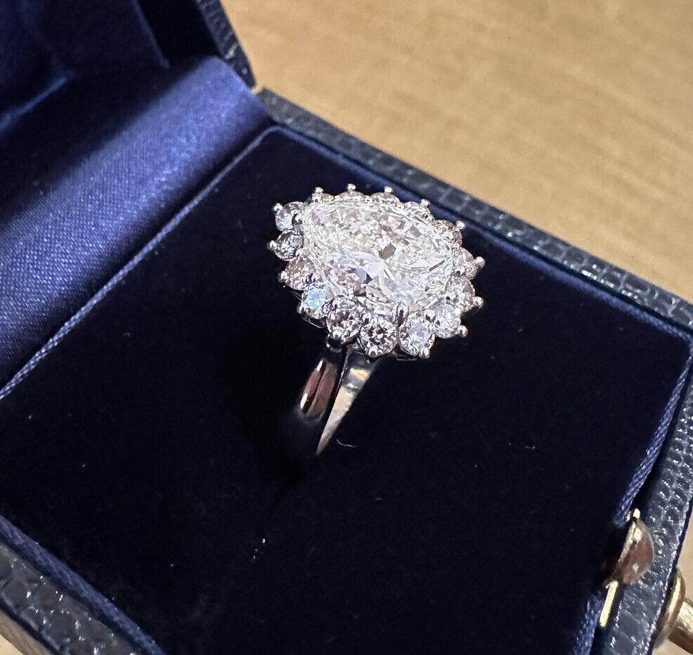 Pear Cut GIA 3.10 Carat Pear Brilliant Diamond Ring with Diamonds in Platinum For Sale