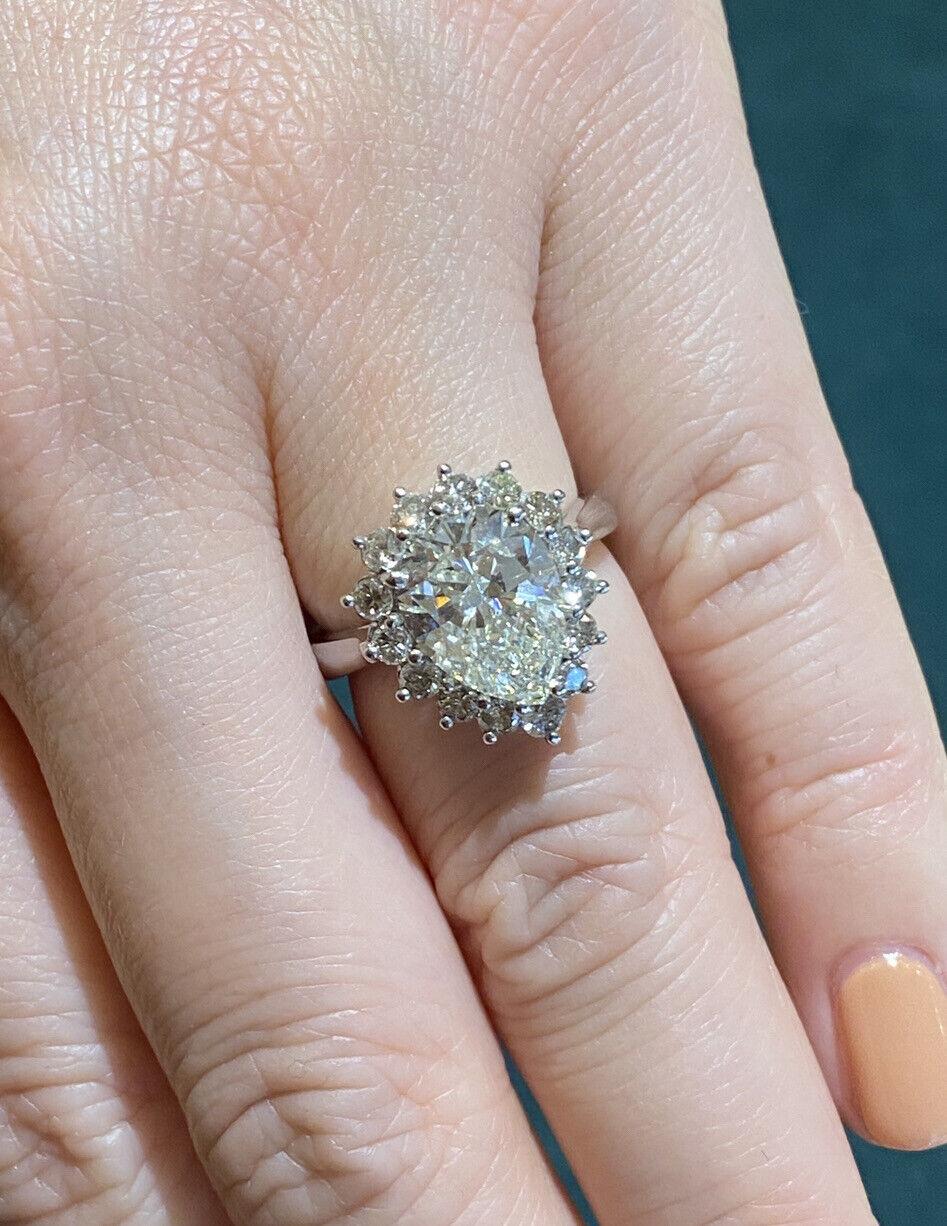 GIA 3.10 Carat Pear Brilliant Diamond Ring with Diamonds in Platinum In Excellent Condition For Sale In La Jolla, CA