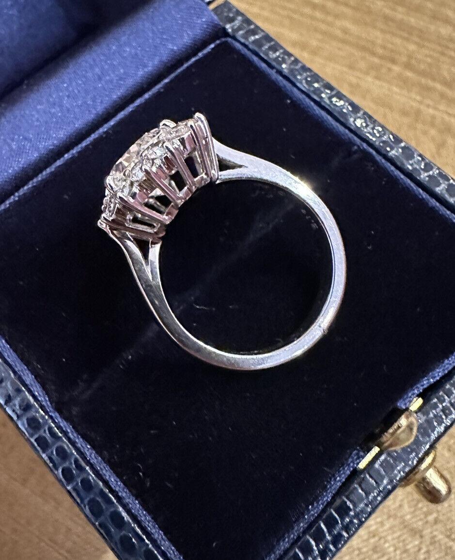 GIA 3.10 Carat Pear Brilliant Diamond Ring with Diamonds in Platinum For Sale 4