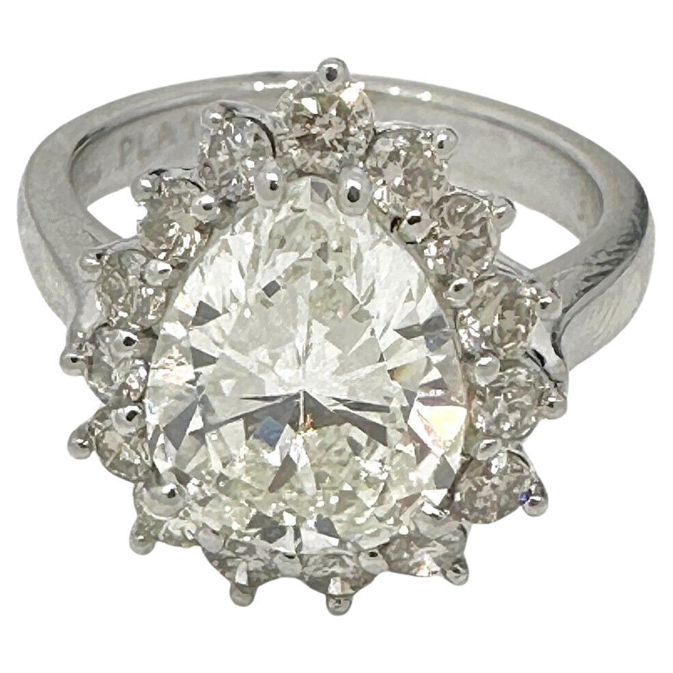 GIA 3.10 Carat Pear Brilliant Diamond Ring with Diamonds in Platinum For Sale