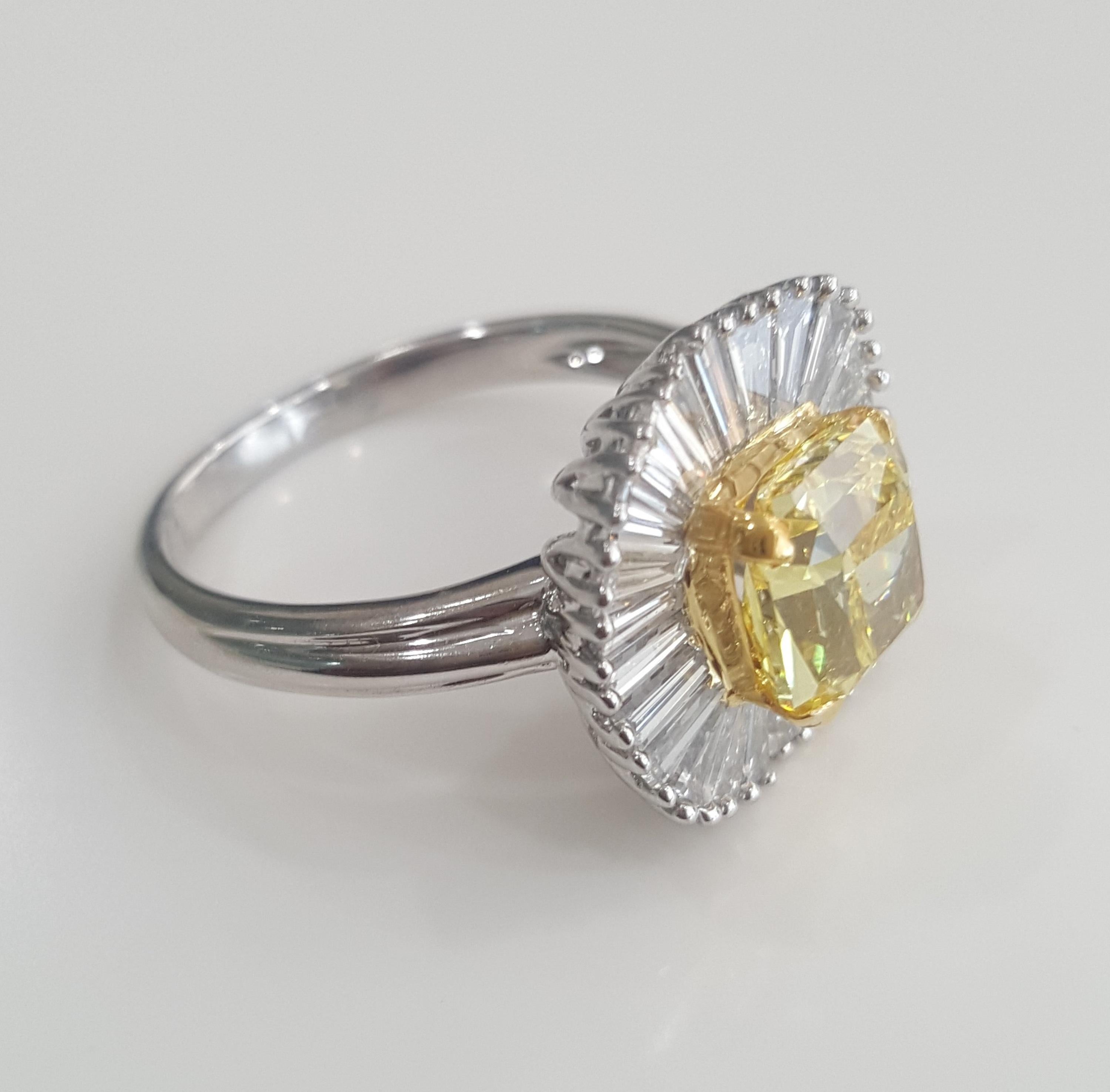 GIA 3.12 Carat Natural Fancy Vivid Yellow Radiant And Baguettes Diamond Ring.  In New Condition For Sale In New York, NY