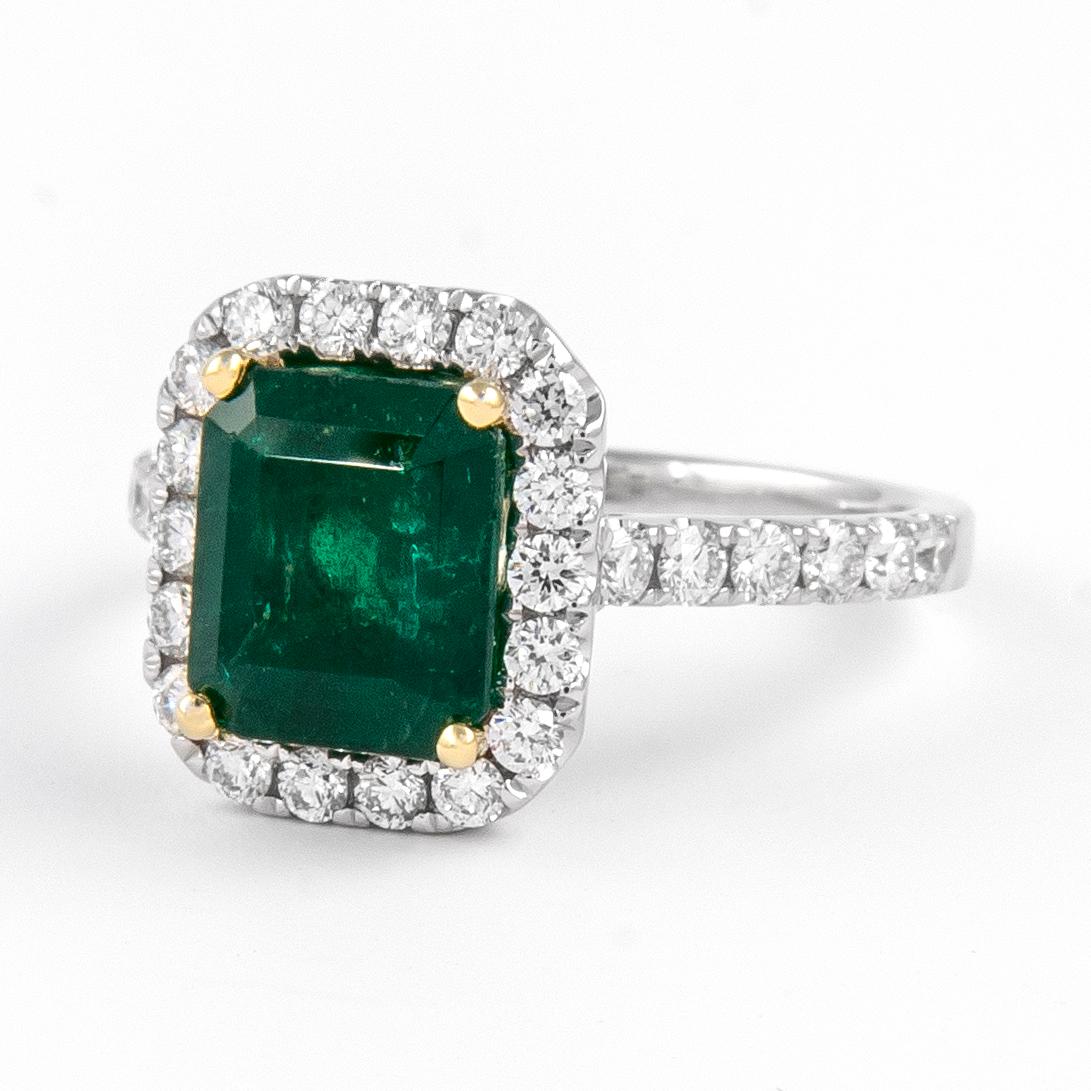Classic emerald and diamond halo ring, GIA certified. 
3.23 carats total gemstone weight.
2.51 carat emerald cut emerald, F2, GIA certified. Complimented by 30 round brilliant diamonds, 0.72 carats, F/G color and VS clarity. 18k white and yellow