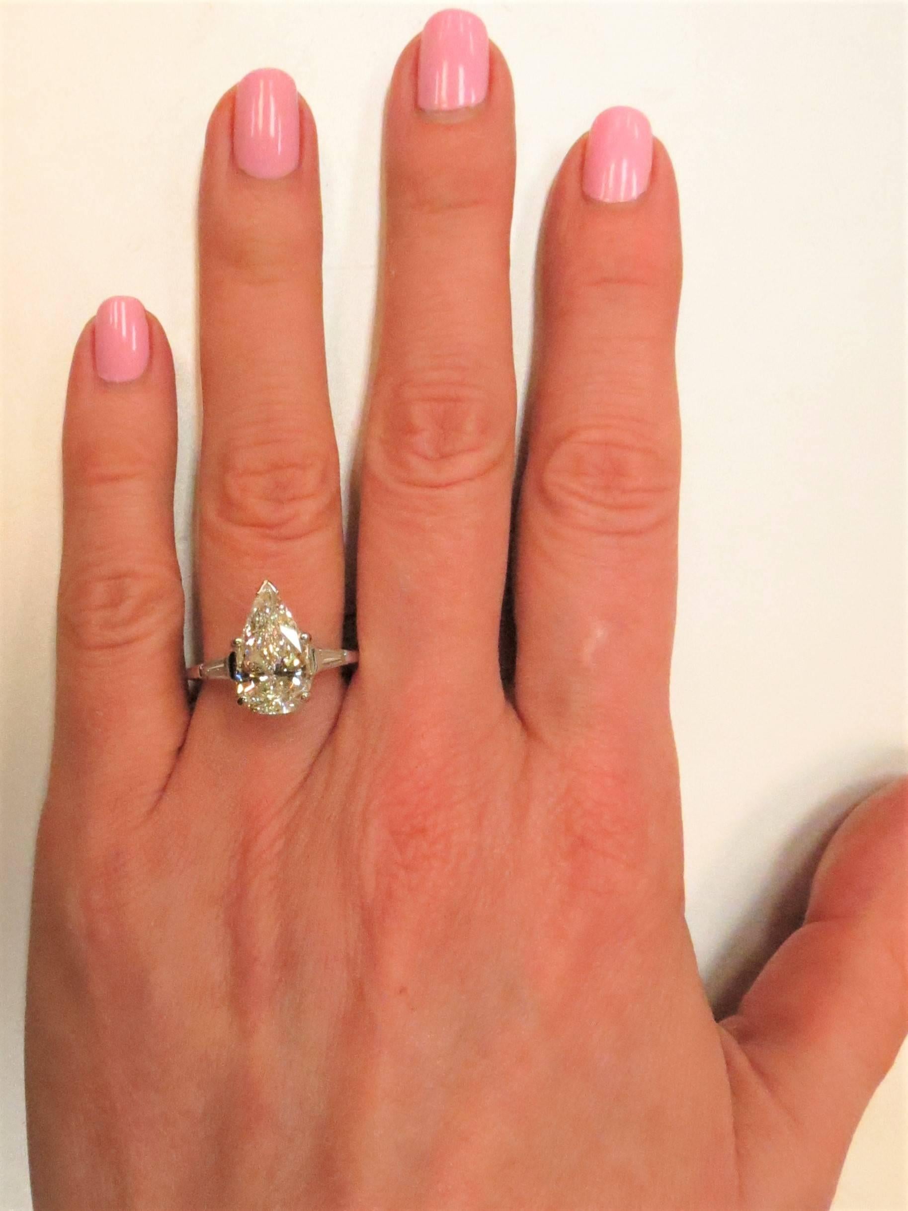 Contemporary GIA 3.34 Pear Shape Diamond with Tapered Baguettes Engagement Ring