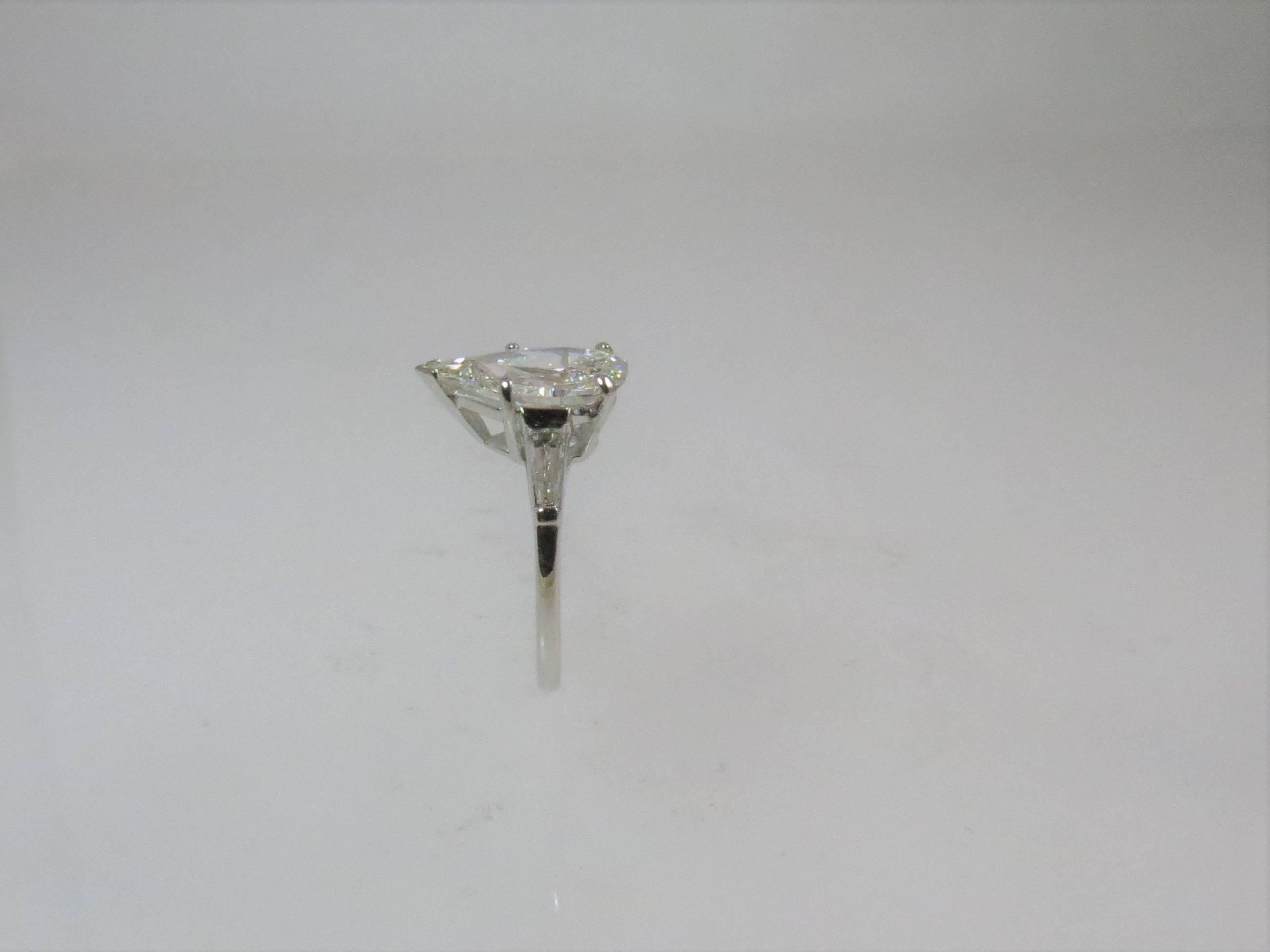 GIA 3.34 Pear Shape Diamond with Tapered Baguettes Engagement Ring In Excellent Condition In Chicago, IL