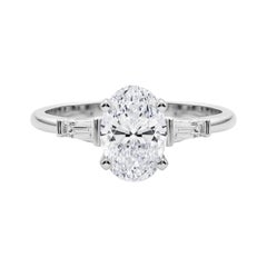 GIA 3.3ct Oval Three-Stone Tapered Baguette 18K White Gold Diamond Ring