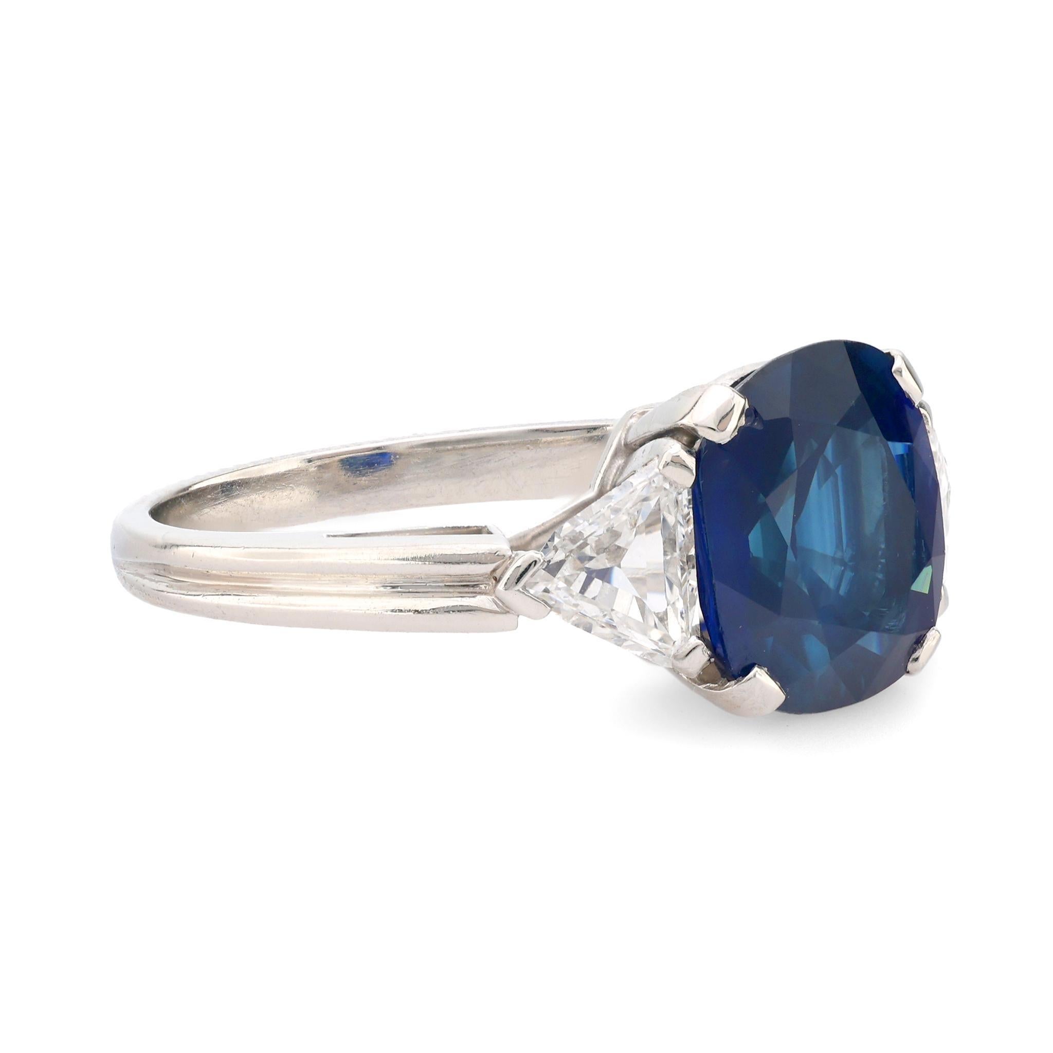 Modern GIA 3.42 carat cushion cut sapphire diamond platinum three stone ring