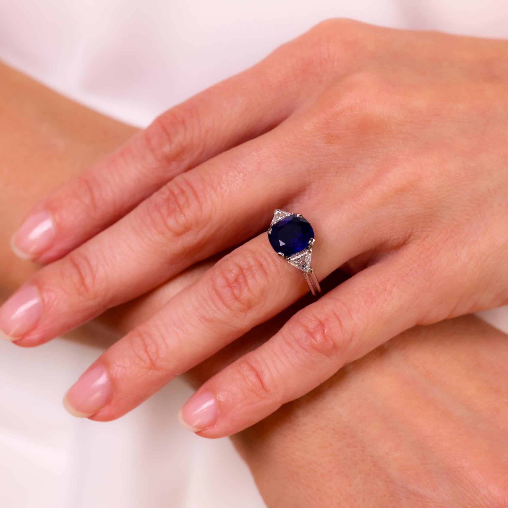 Cushion Cut GIA 3.42 carat cushion cut sapphire diamond platinum three stone ring