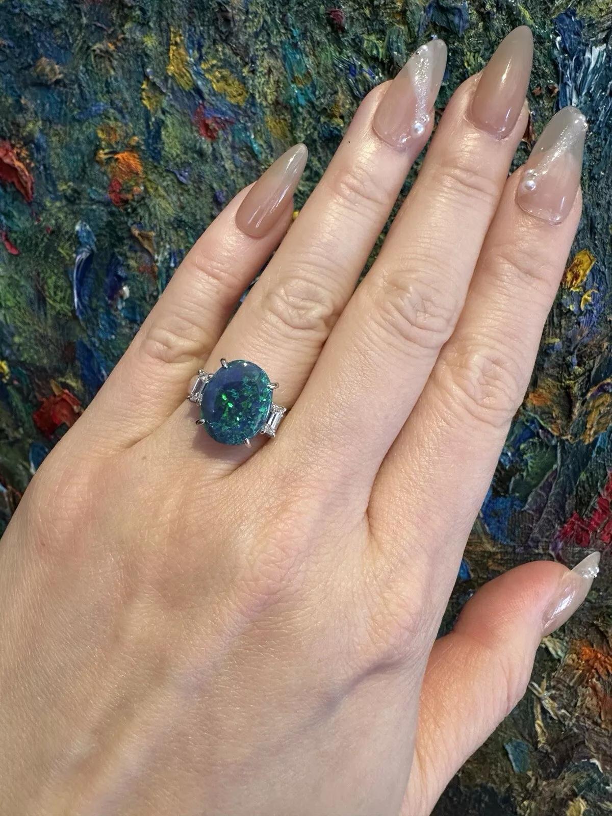 Oval Cut GIA 3.59 ct Black Opal and Diamond 3-stone Ring in Platinum For Sale