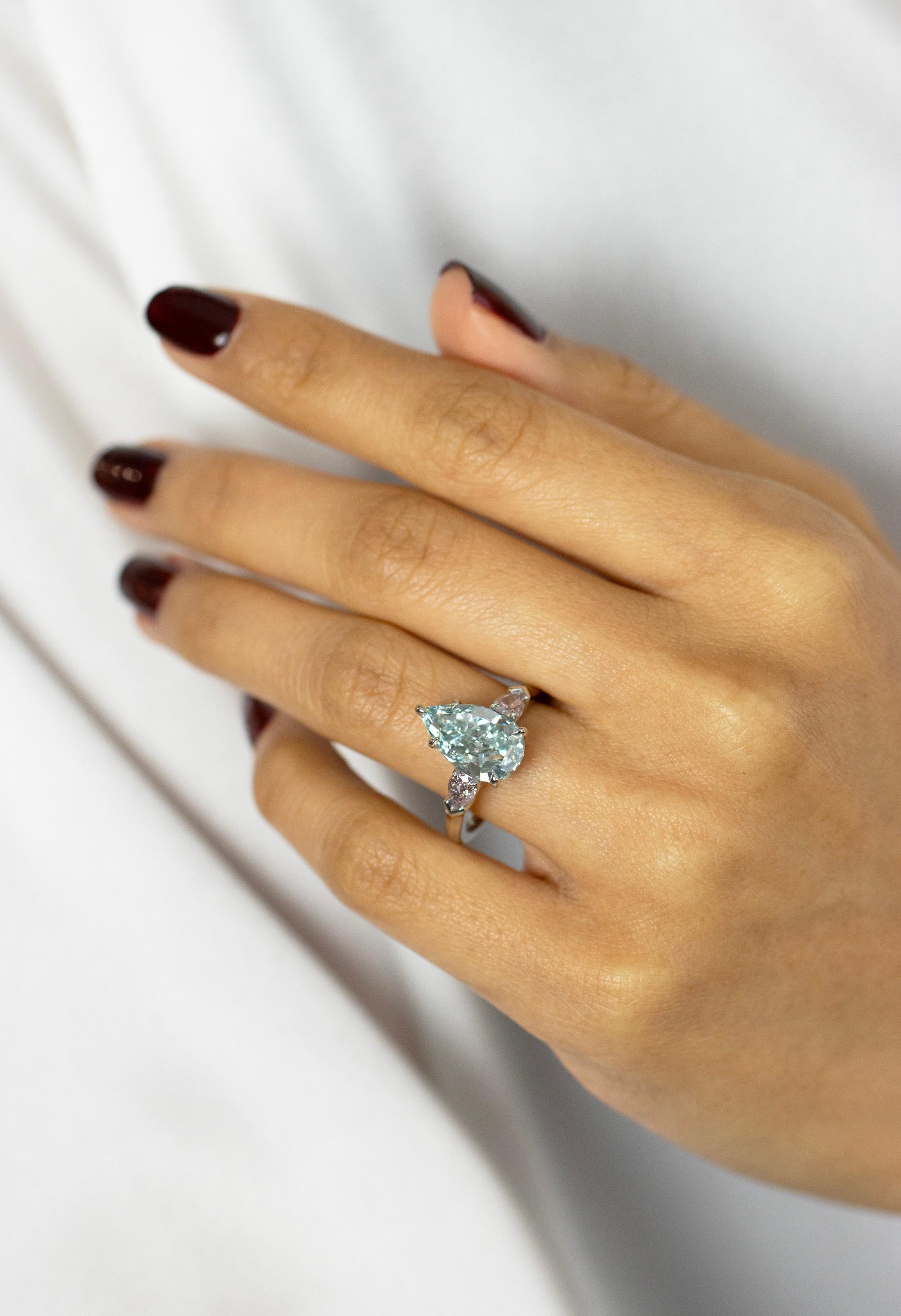 GIA 3.68 Carat Pear Cut Fancy Intense Green-Blue Diamond Three Stone Ring For Sale 6