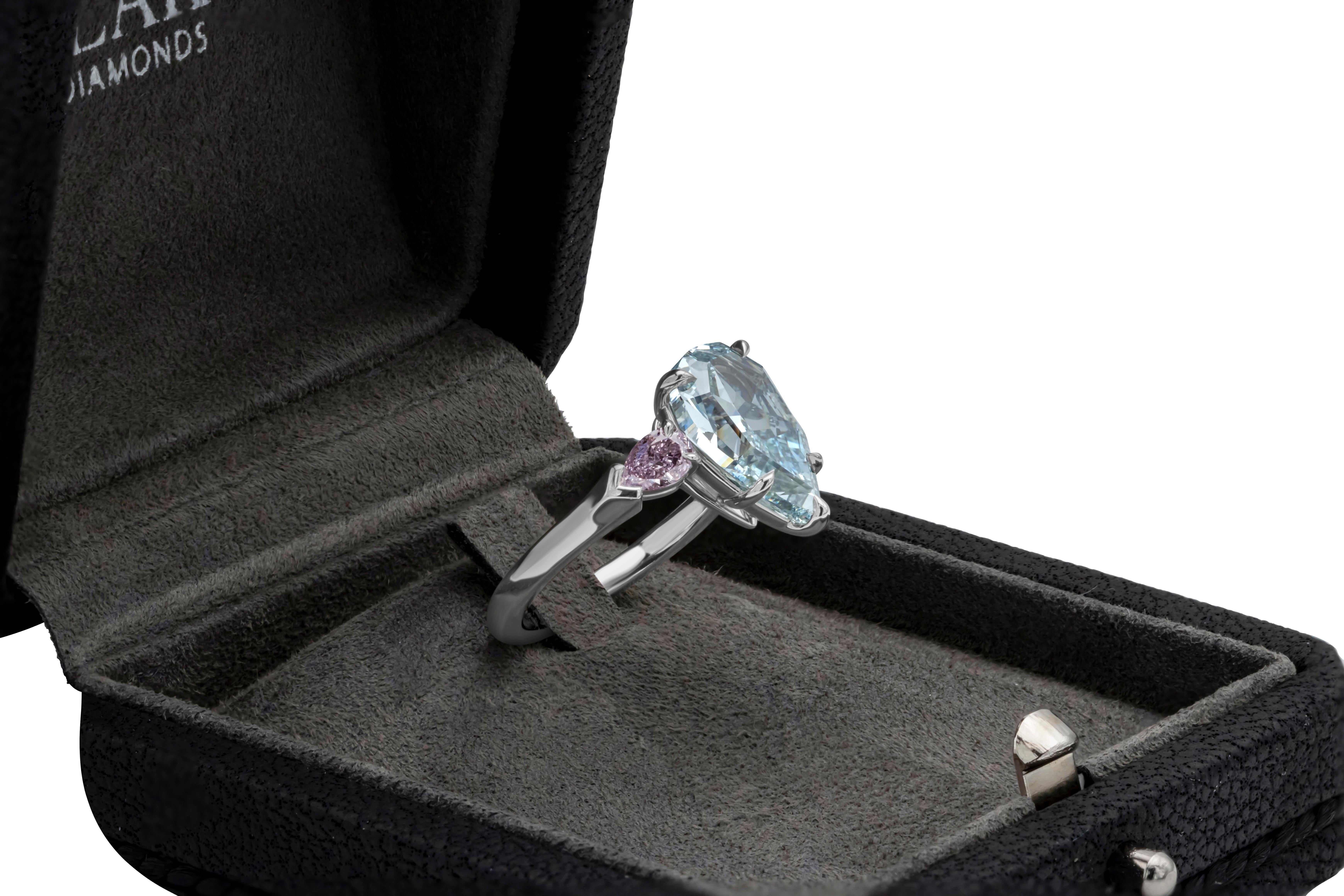 GIA 3.68 Carat Pear Cut Fancy Intense Green-Blue Diamond Three Stone Ring For Sale 1