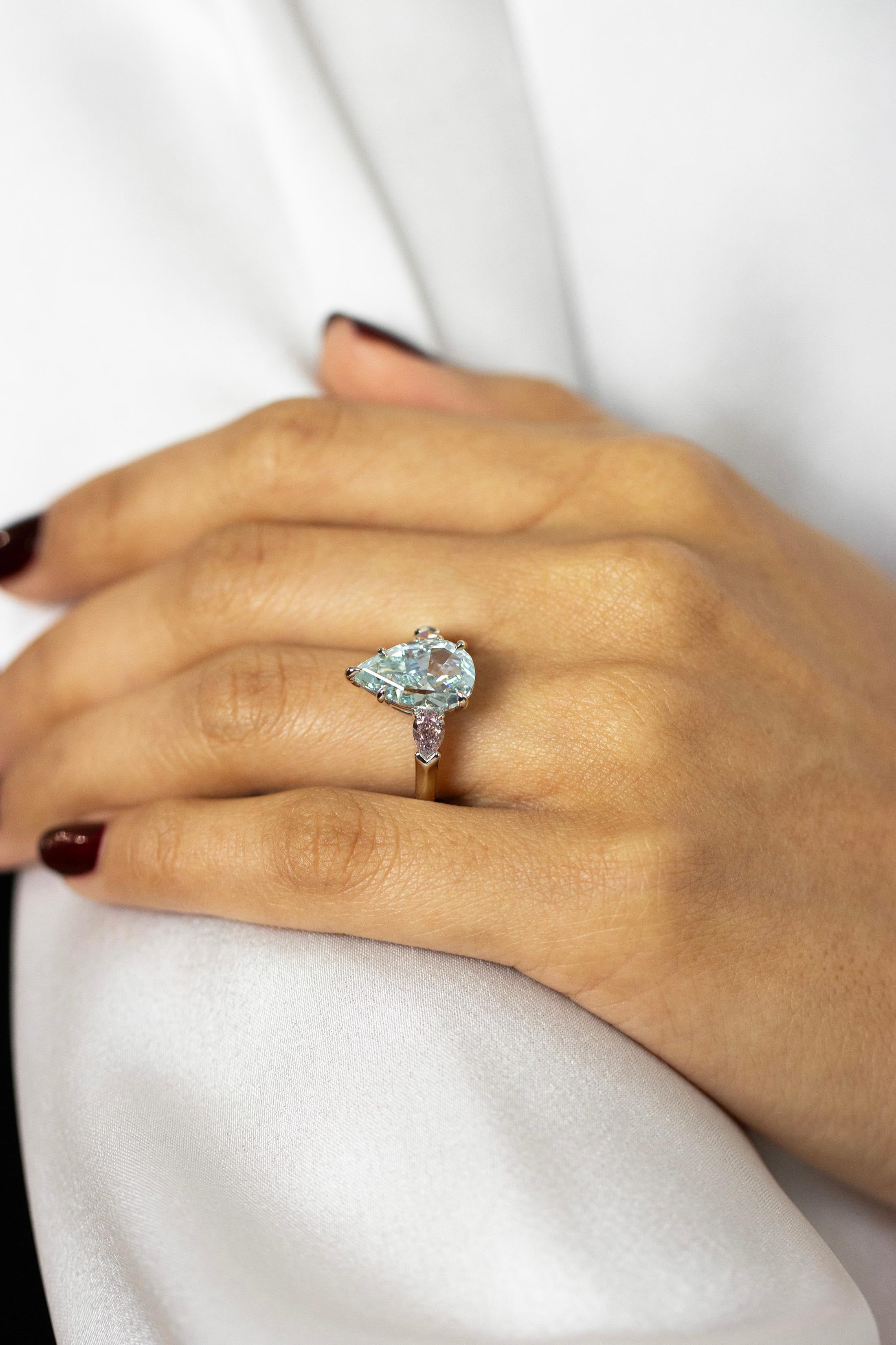 GIA 3.68 Carat Pear Cut Fancy Intense Green-Blue Diamond Three Stone Ring For Sale 5