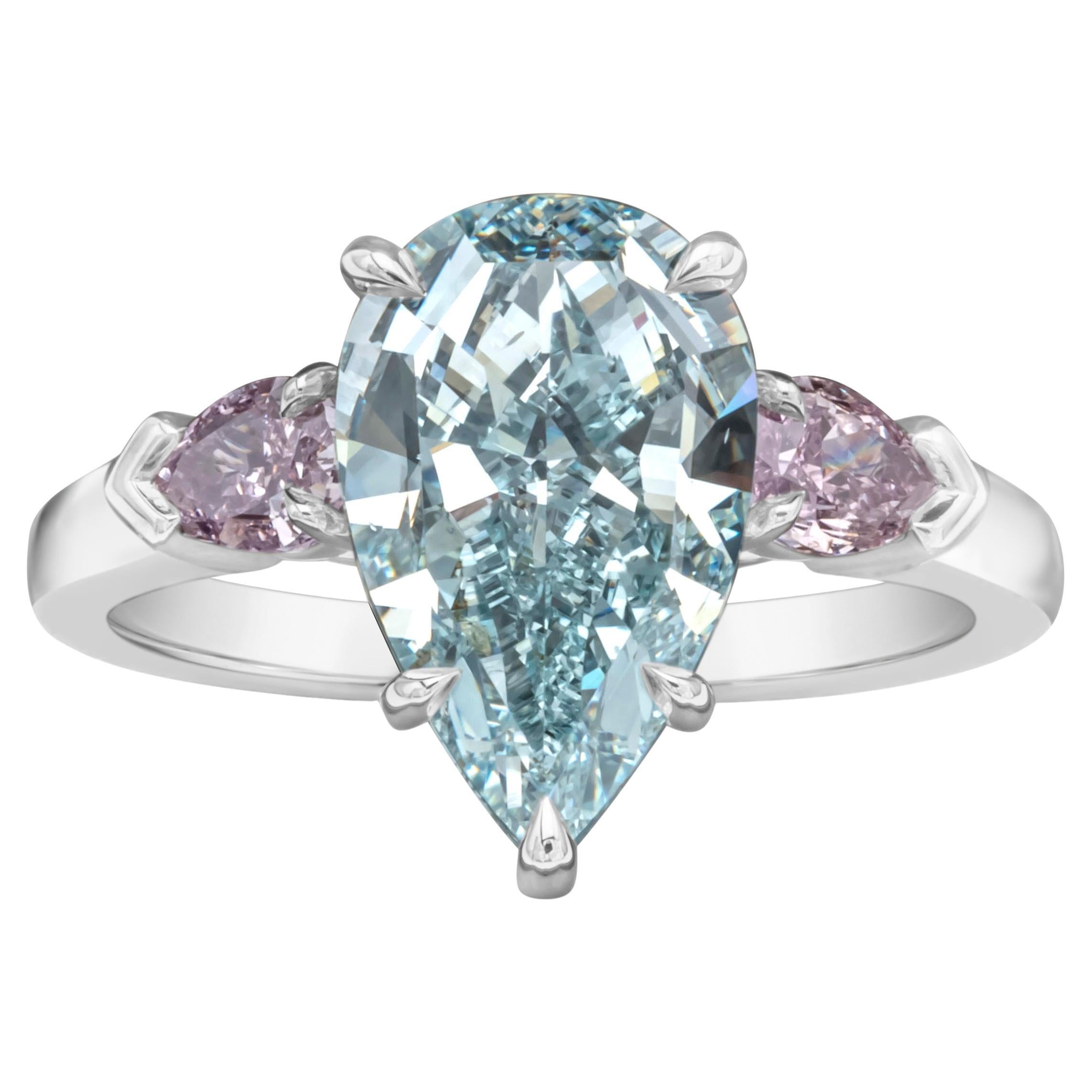 GIA 3.68 Carat Pear Cut Fancy Intense Green-Blue Diamond Three Stone Ring