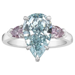 GIA 3.68 Carat Pear Cut Fancy Intense Green-Blue Diamond Three Stone Ring