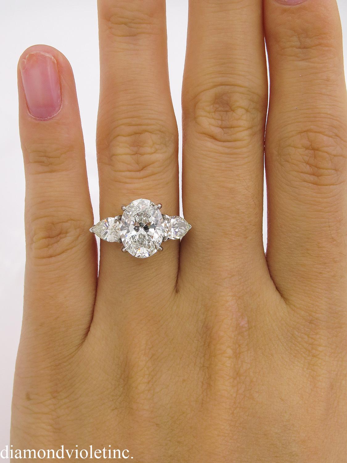 GIA 3.70 Carat Vintage Oval Diamond Three-Stone Engagement Wedding Platinum Ring 6