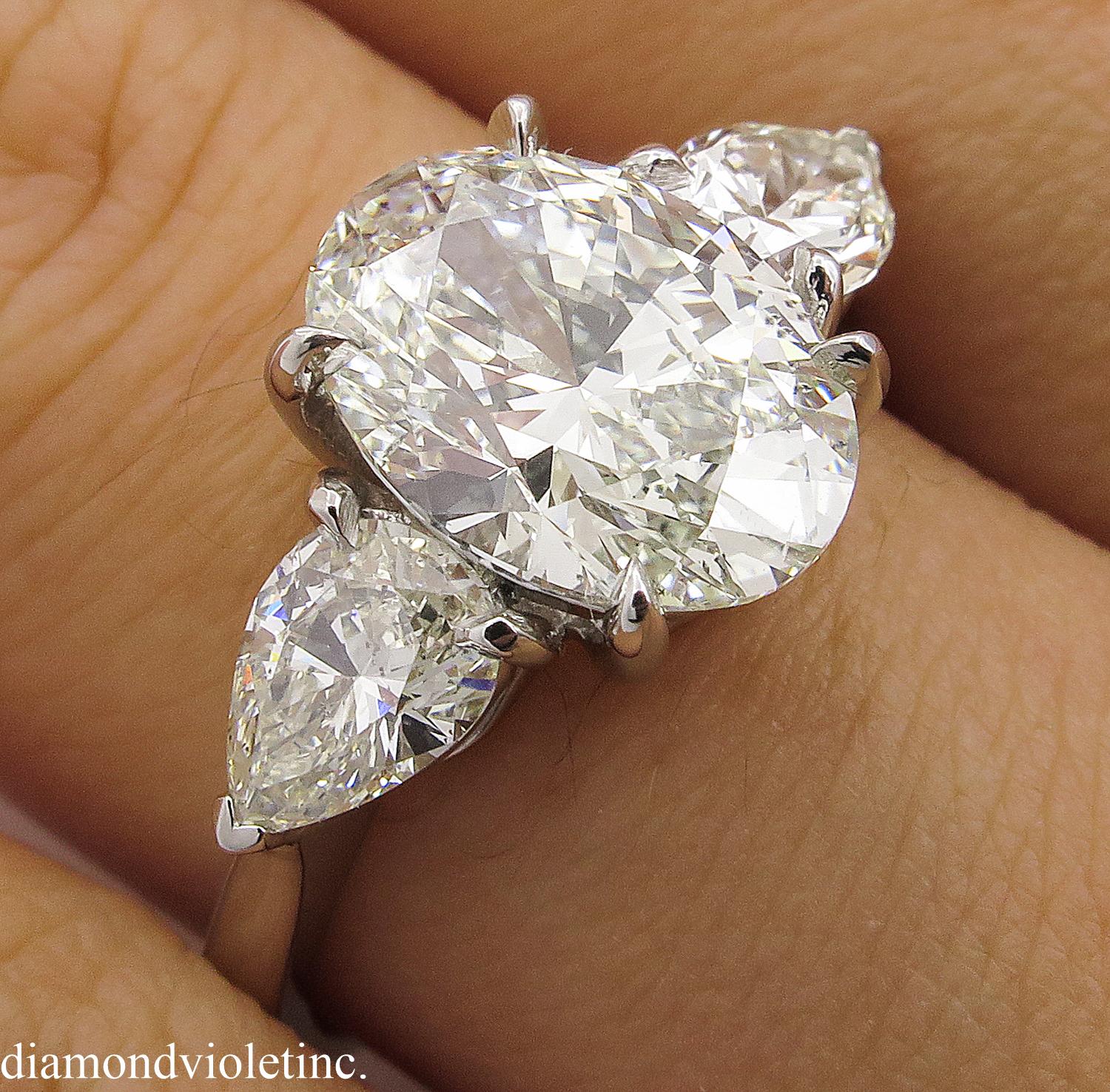 GIA 3.70 Carat Vintage Oval Diamond Three-Stone Engagement Wedding Platinum Ring 8