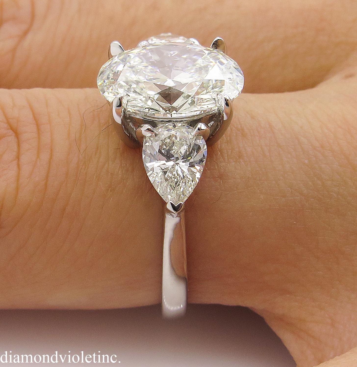 GIA 3.70 Carat Vintage Oval Diamond Three-Stone Engagement Wedding Platinum Ring 10