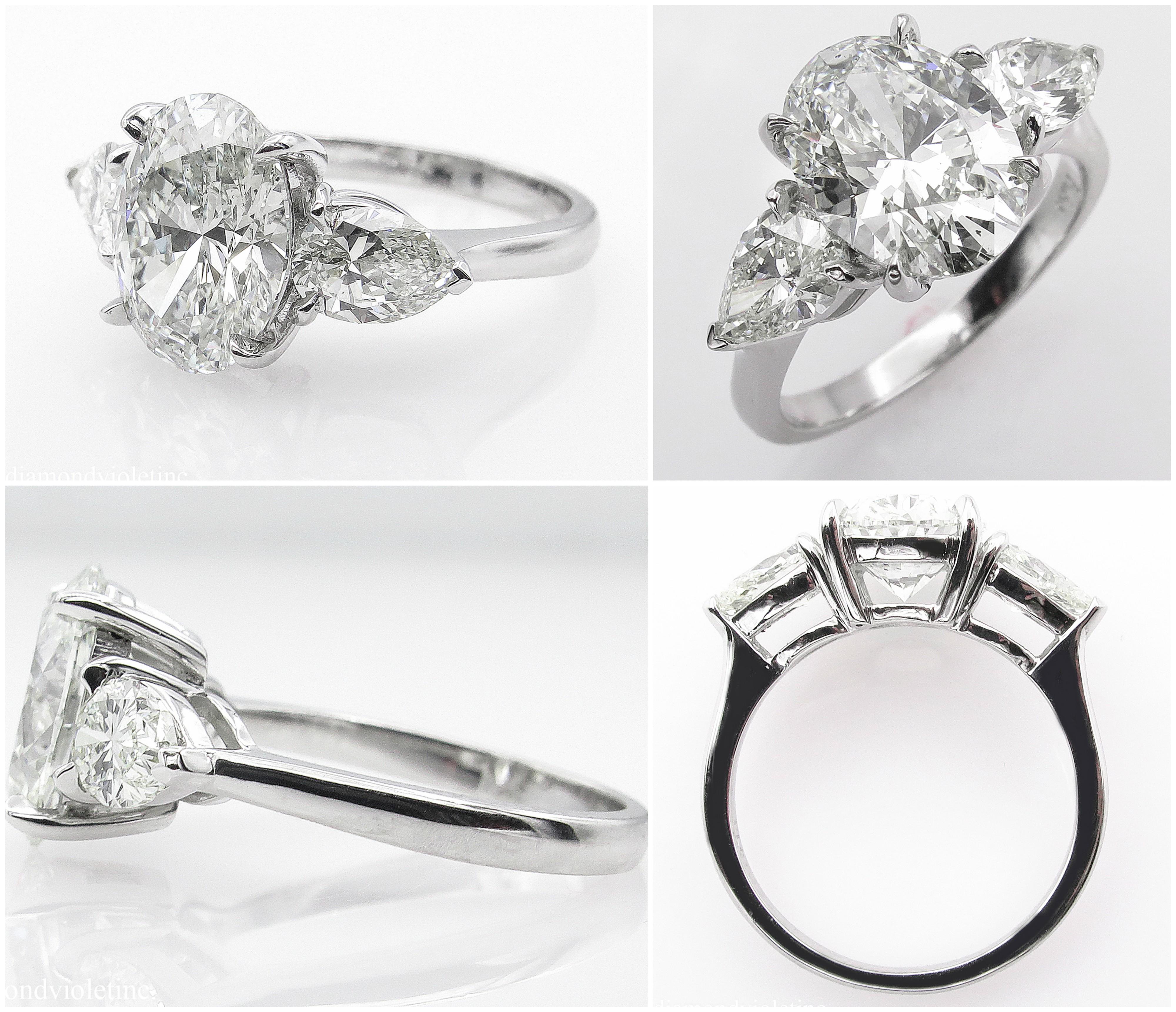 Women's or Men's GIA 3.70 Carat Vintage Oval Diamond Three-Stone Engagement Wedding Platinum Ring