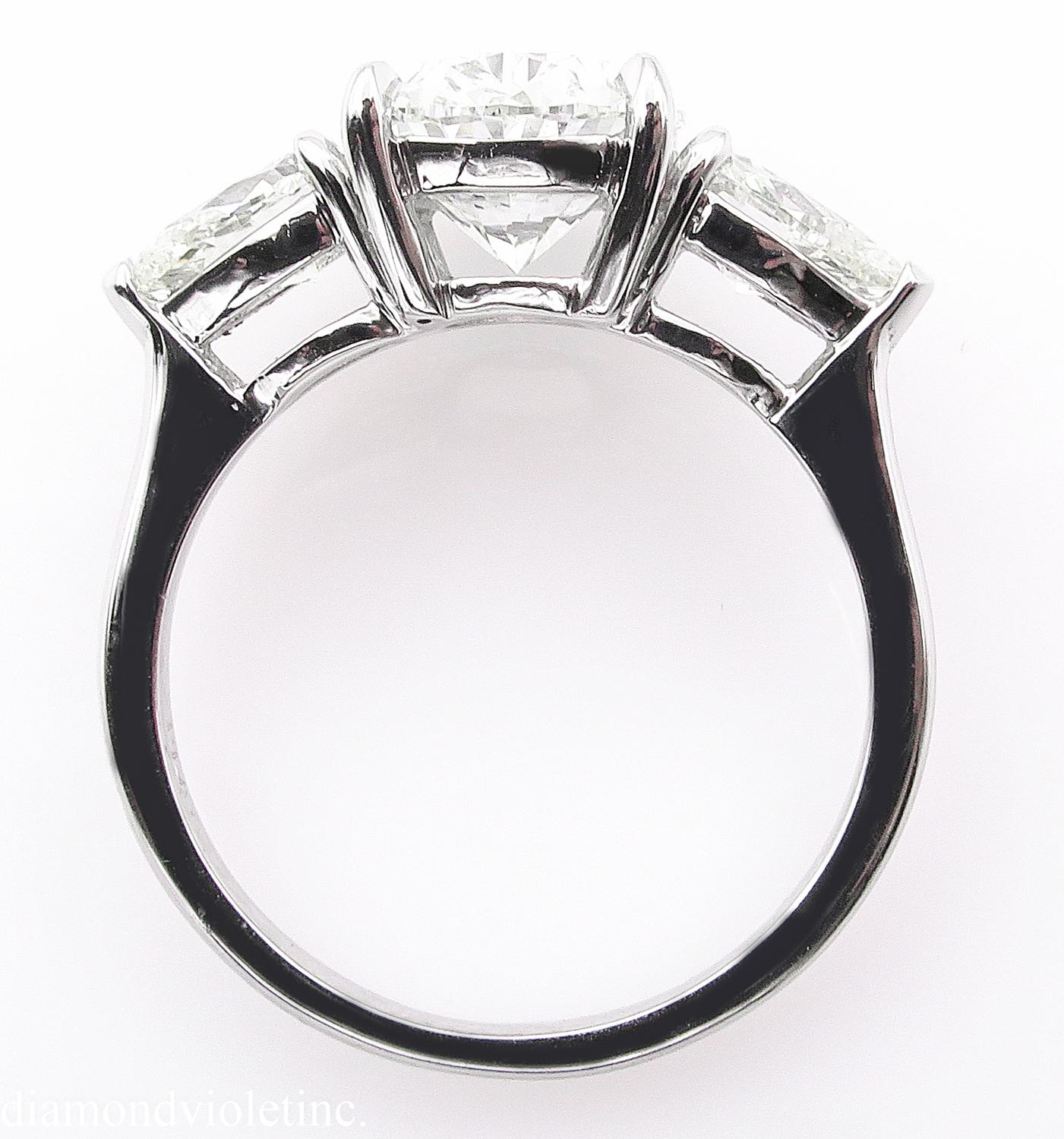 GIA 3.70 Carat Vintage Oval Diamond Three-Stone Engagement Wedding Platinum Ring 3