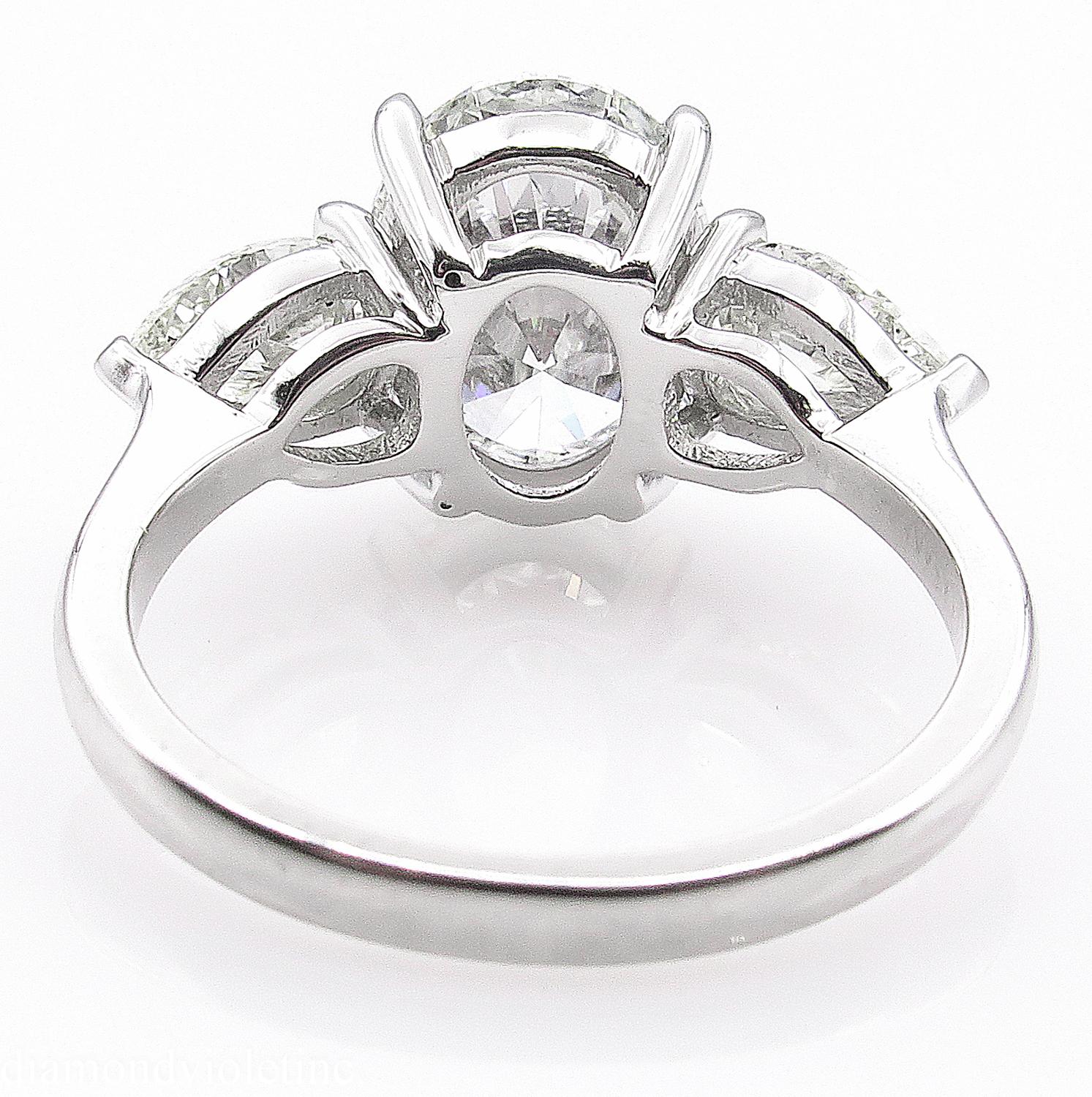 GIA 3.70 Carat Vintage Oval Diamond Three-Stone Engagement Wedding Platinum Ring 4