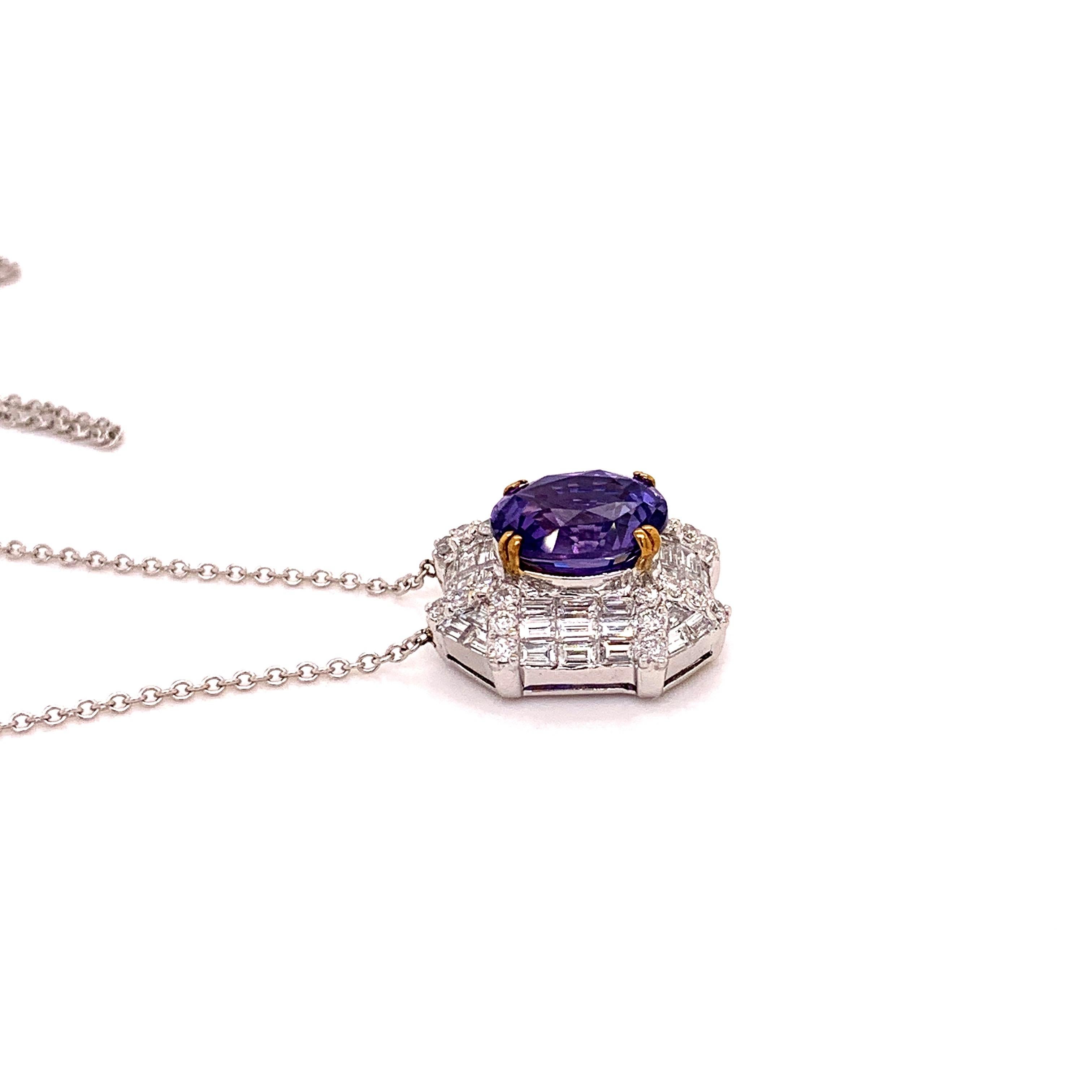 Rare unheated sapphire pendant. High lustre, rare unheated, Sri Lanka origin, oval faceted, 3.83 carats colour-changing violet-purple sapphire mounted in high profile with eight prongs, accented with sparkling baguette diamonds, round brilliant cut