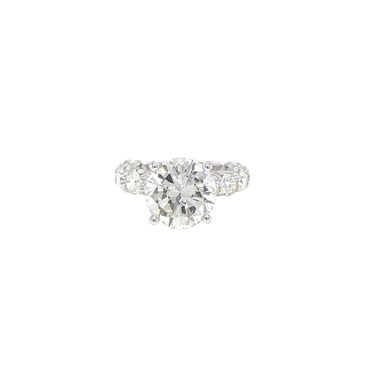 Modernist GIA 3.95ct Center Natural Round Diamond with 2ct Round Diamonds White Gold Ring For Sale