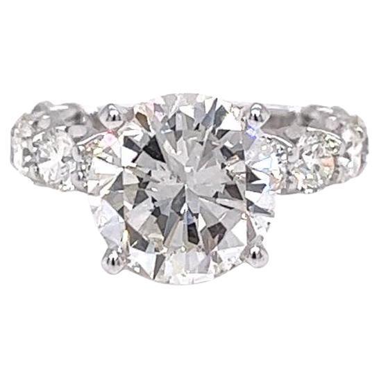 GIA 3.95ct Center Natural Round Diamond with 2ct Round Diamonds White Gold Ring For Sale