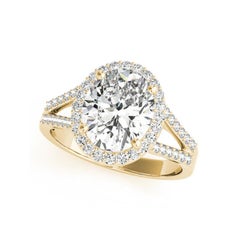 GIA Anello con diamante ovale aureolato a canestro aperto in oro giallo 18 carati