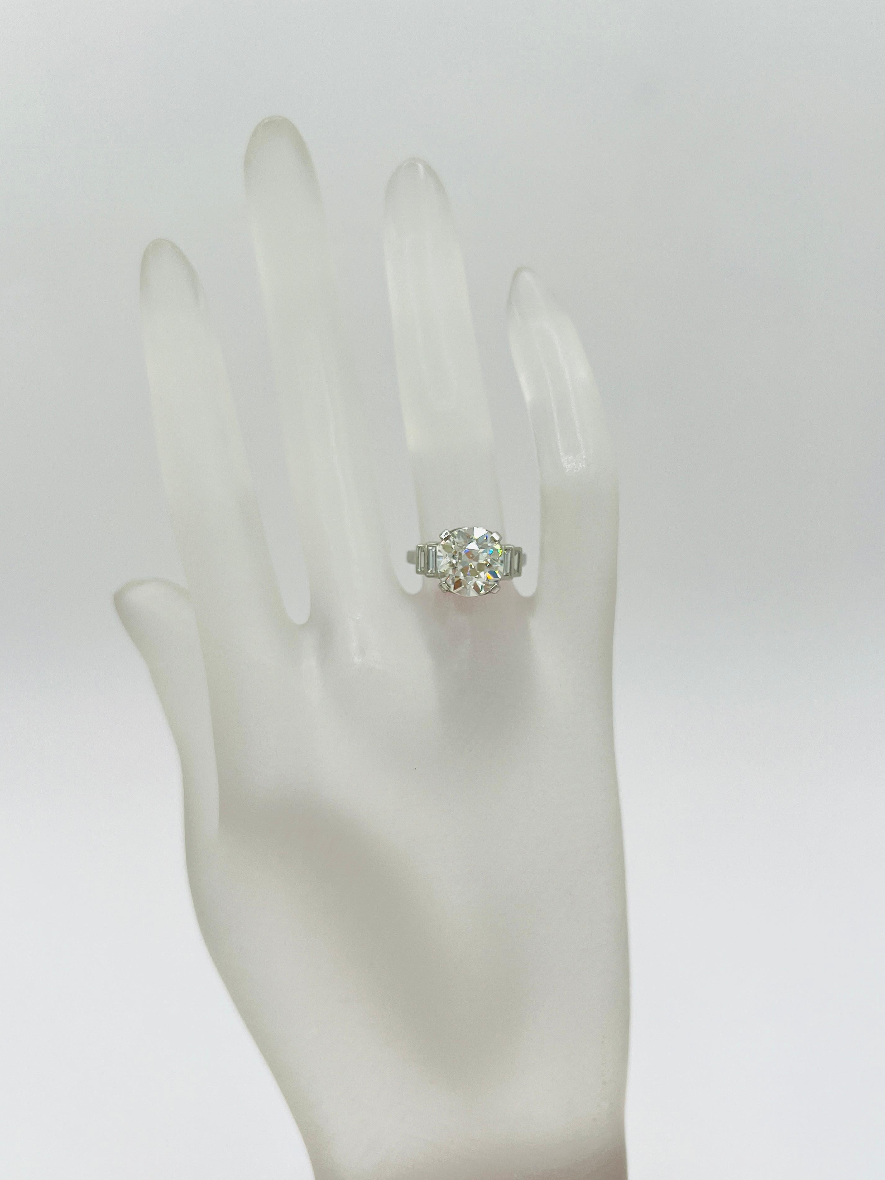 Old European Cut GIA 4 Carat Old European and Emerald Cut White Diamond Ring in Platinum