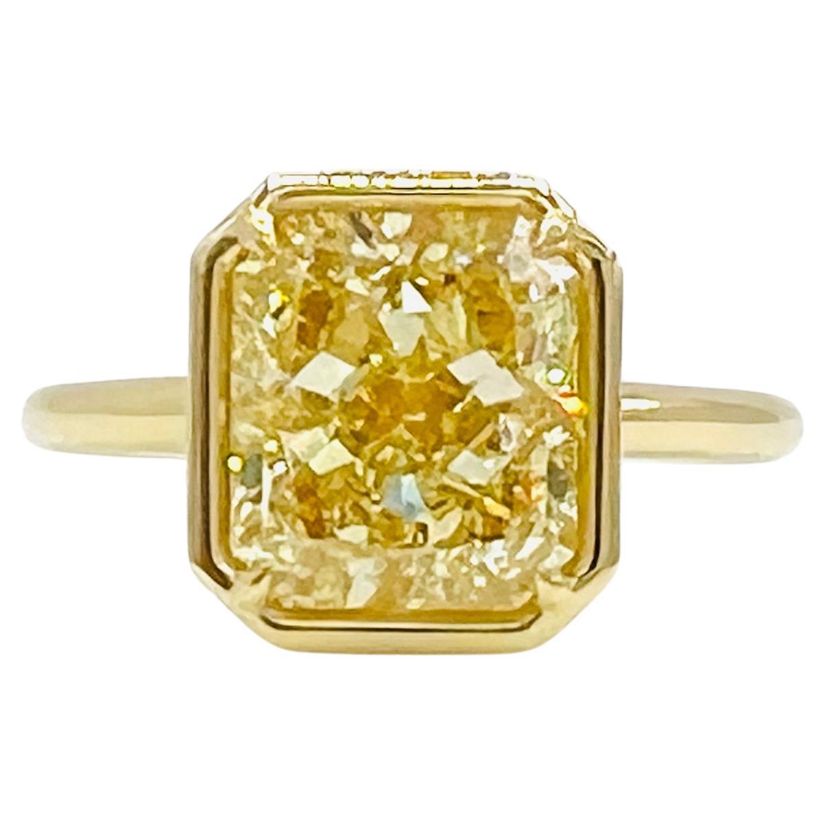 GIA 4 Carat Yellow Diamond Radiant Bezel Ring in 18K Yellow Gold