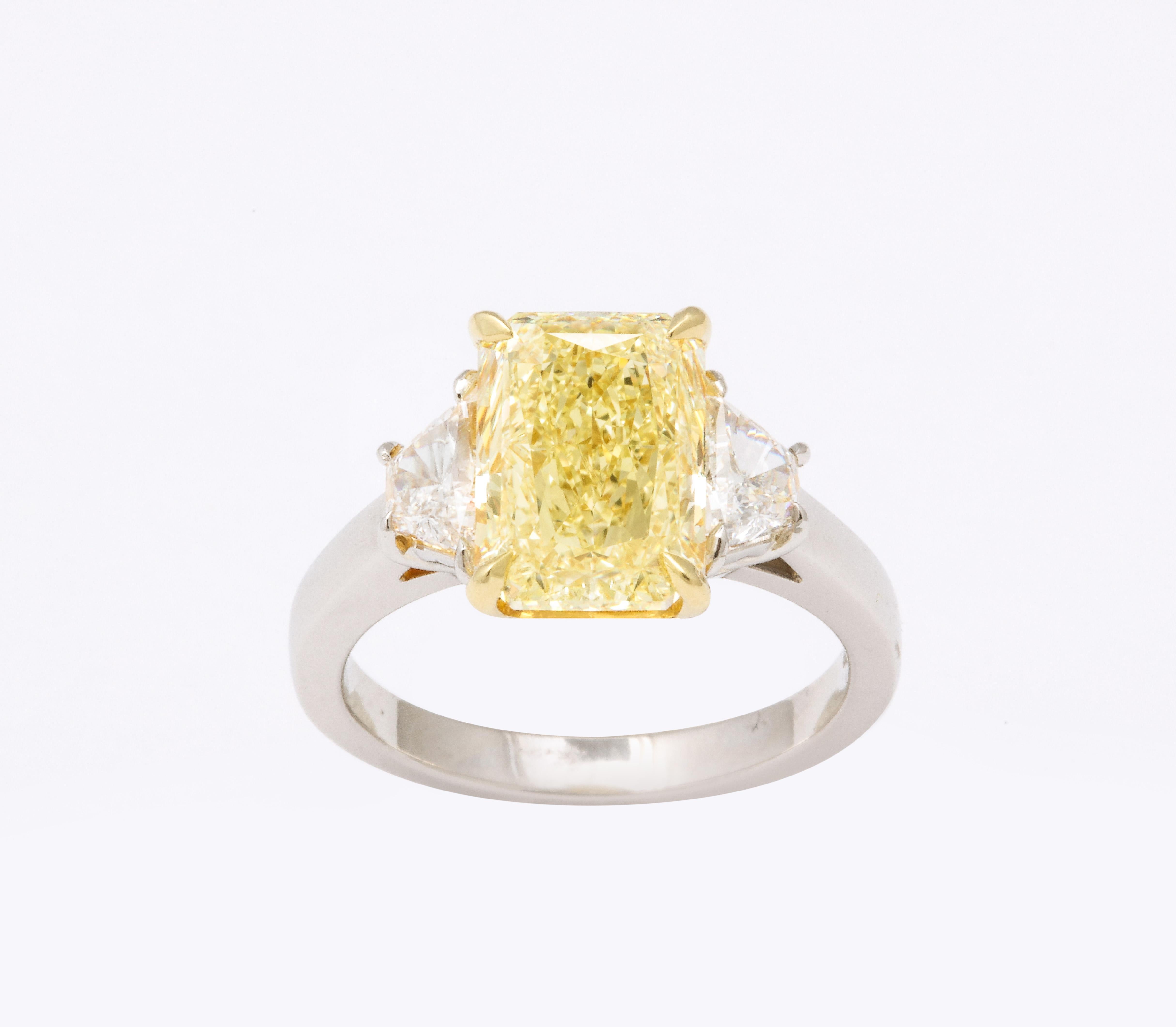 Radiant Cut GIA 4 Carat Yellow Diamond Ring