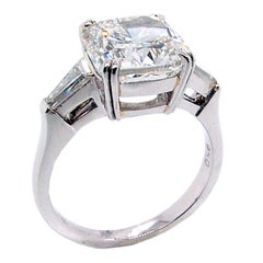 GIA 4.01 Carat H/VS2 Cushion Cut Diamond Platinum 3-Stone Engagement Ring