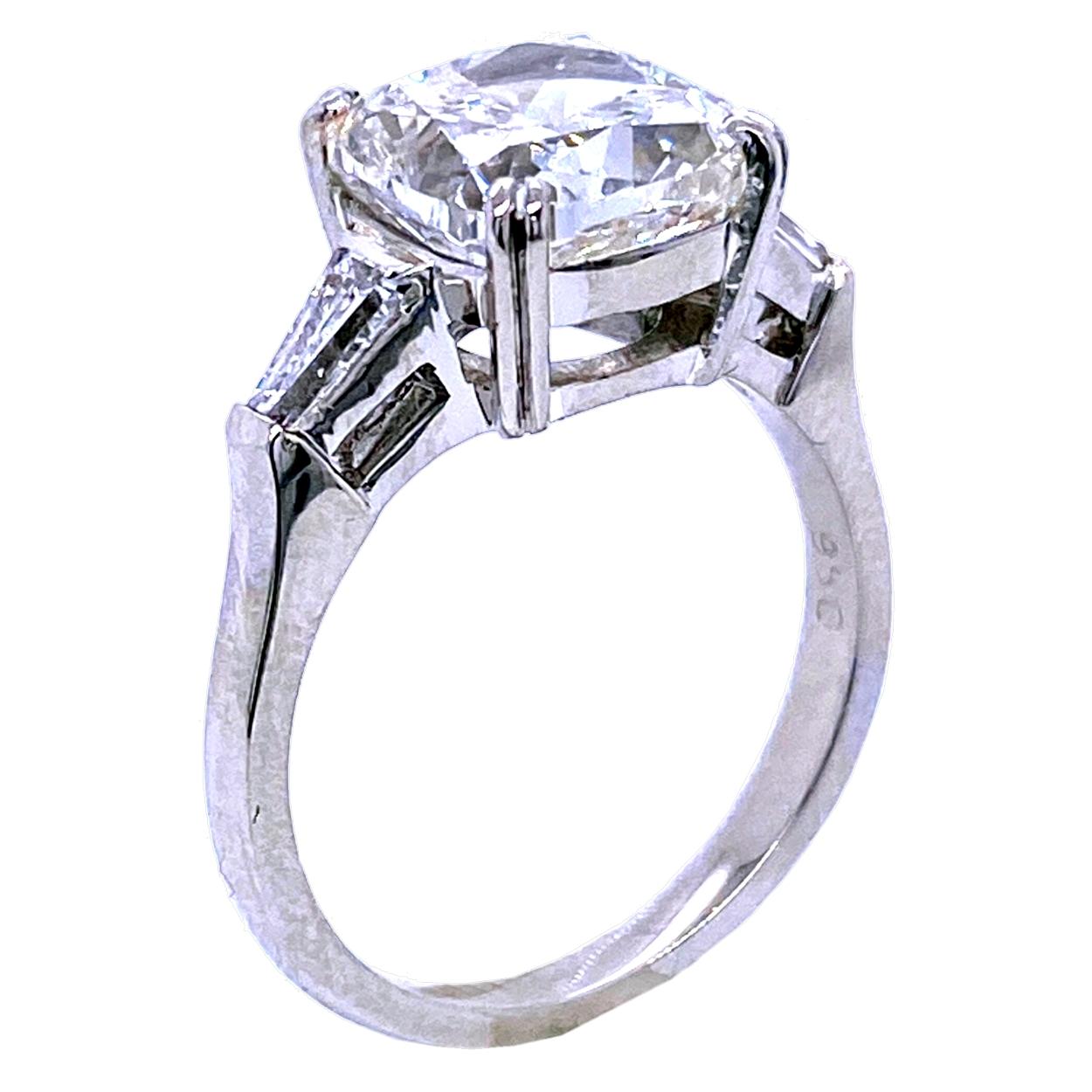Contemporary GIA 4.01 Carat H/VS2 Cushion Cut Diamond Platinum 3-Stone Engagement Ring For Sale