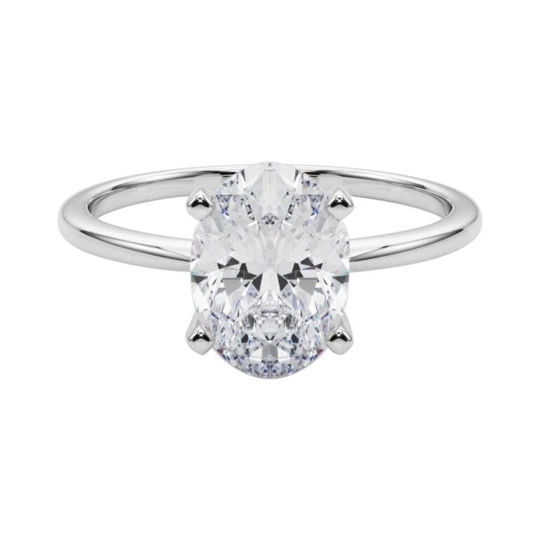 GIA 4,01ct Oval Slim Band Prong Set Solitaire in oro bianco 18K Diamond Ring