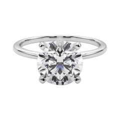 GIA Anillo de diamantes de oro blanco de 18 quilates con solitario engastado con garras y banda estrecha redonda de 4,01 quilates