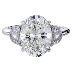 GIA 4,02 carati di diamante taglio ovale E/VS2 Anello sidestone a mezza luna con tre pietre