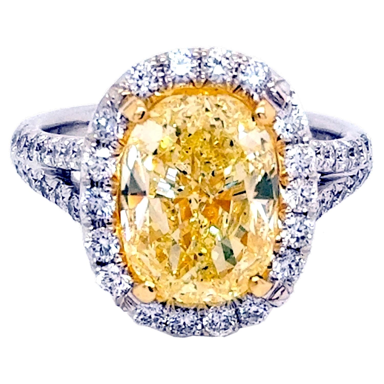 GIA 4.03 Ct Fancy Yellow Oval Diamond French Pave 18K Engagement Ring with Halo For Sale