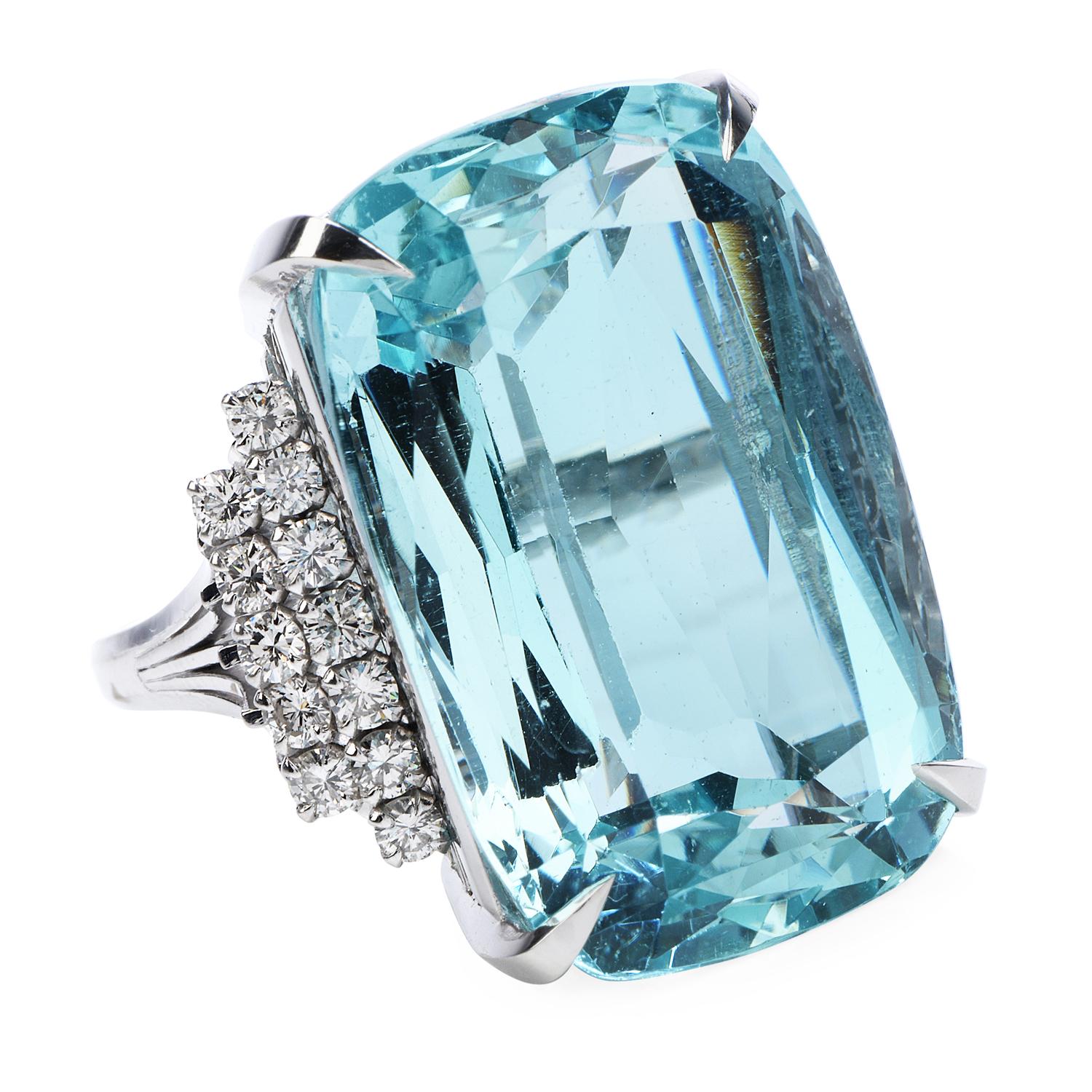 This Sky Blue, full of live Cocktail Ring will captivate the Eyes of everyone!

From the astonishing, center with an Exquisitely GIA Certified Aquamarine,

weighing approx 40.45 carats with 24 round cut diamonds that dance around

and sparkle in any