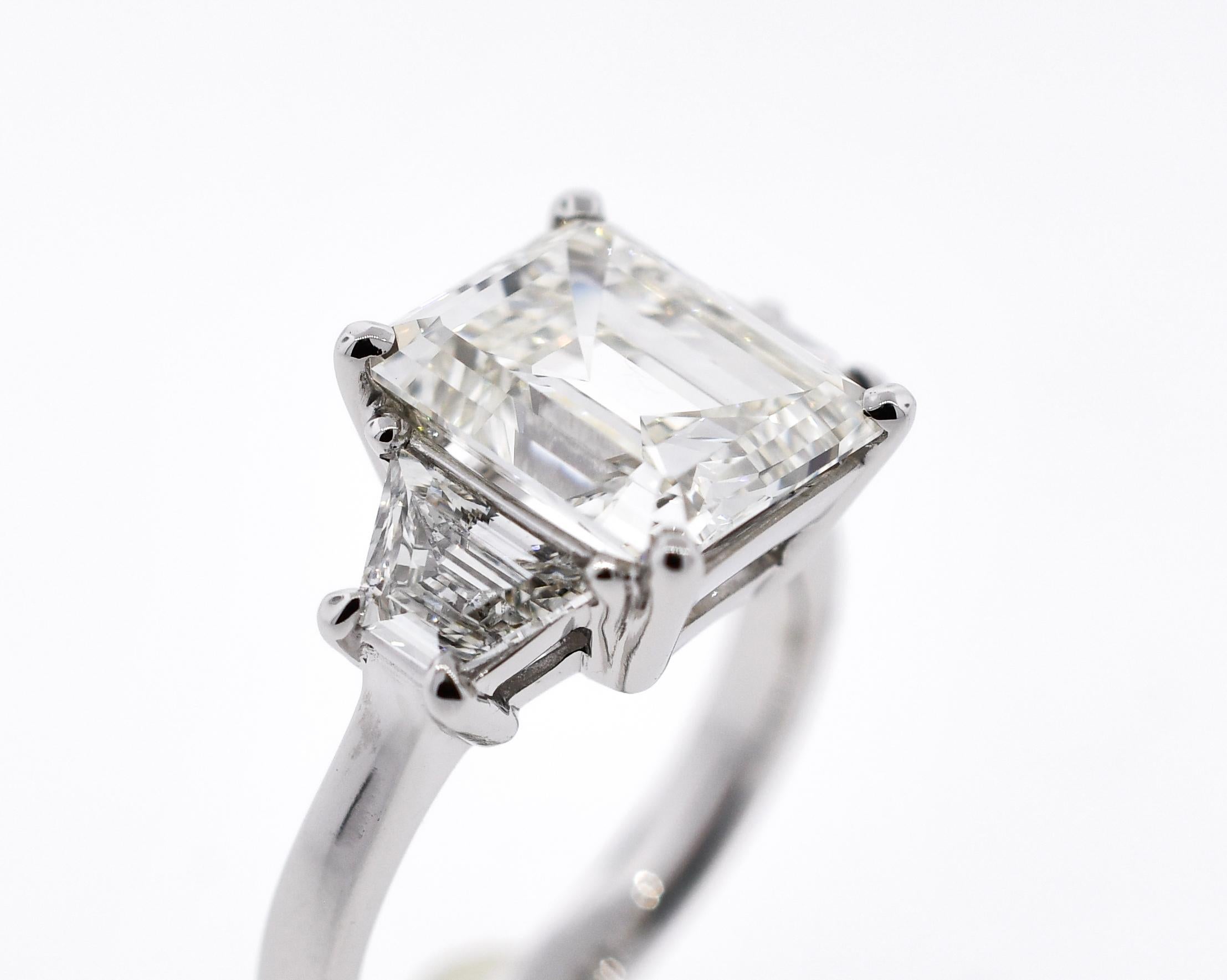 GIA 4.05 Carat Emerald Cut Diamond Three-Stone Ring In New Condition For Sale In Delray Beach, FL