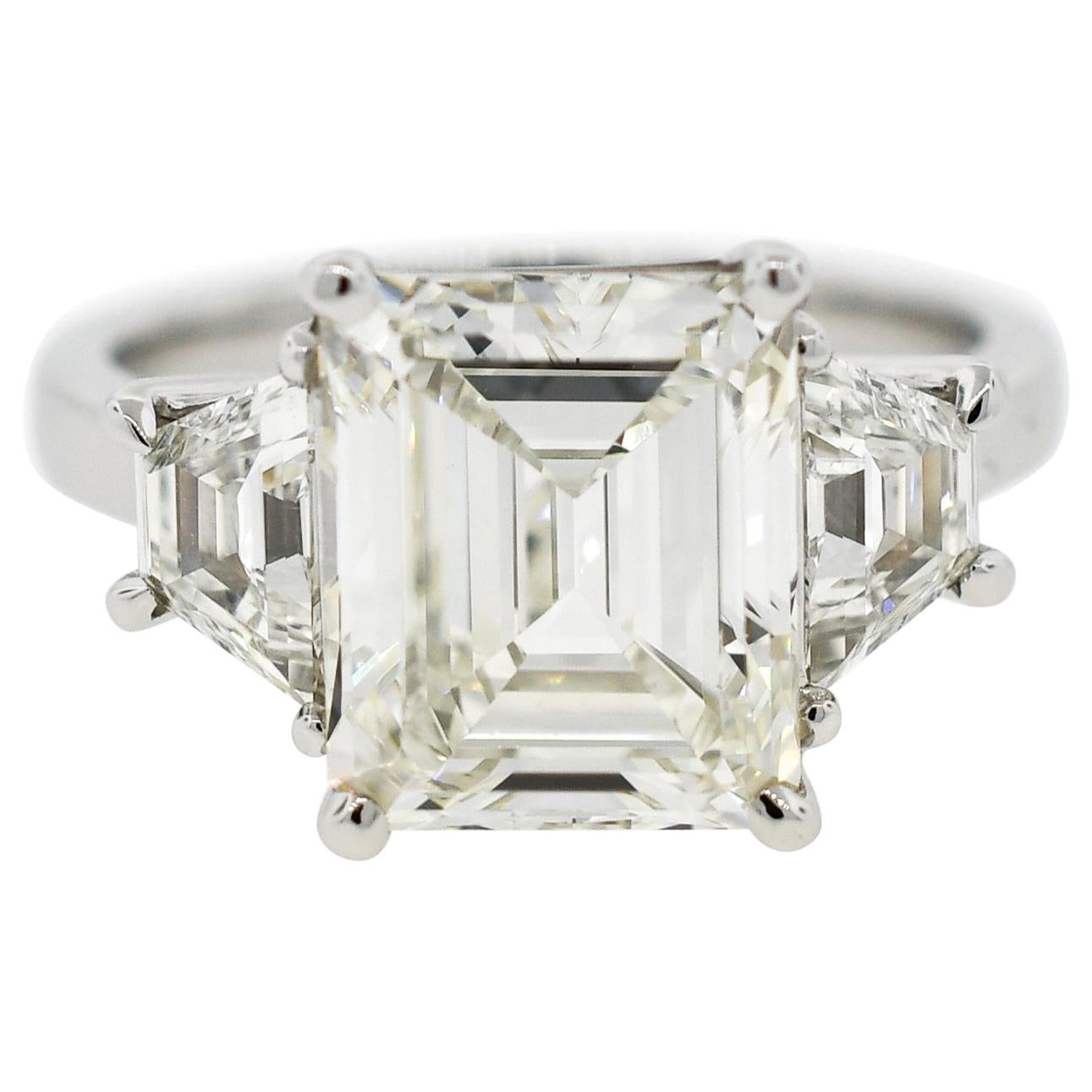 GIA 4.05 Carat Emerald Cut Diamond Three-Stone Ring For Sale