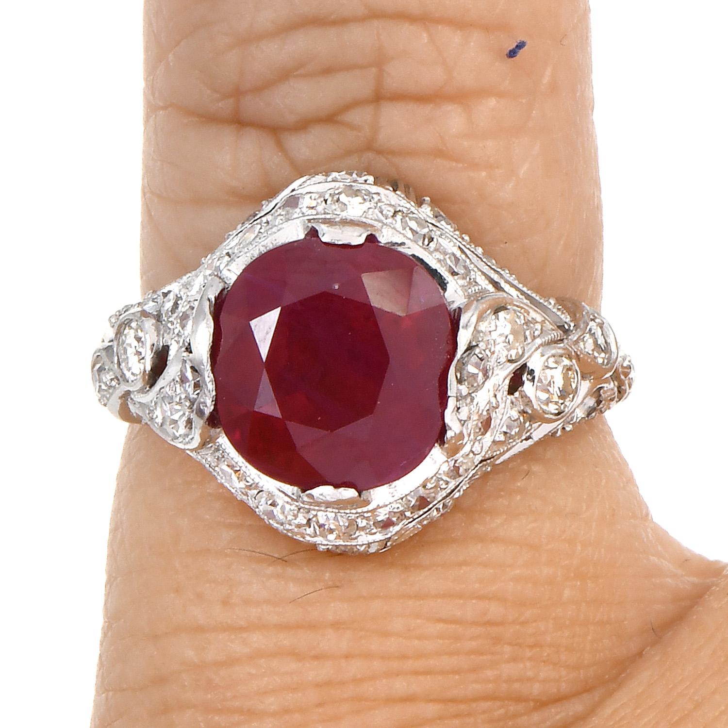 This Vintage ring is Geometrically filigree designed with a bottomless red Burmese Ruby; this can be a magnificent present or an unusual engagement ring.

They are crafted in luxurious platinum, centered by a GIA-certified Red Ruby cushion brilliant