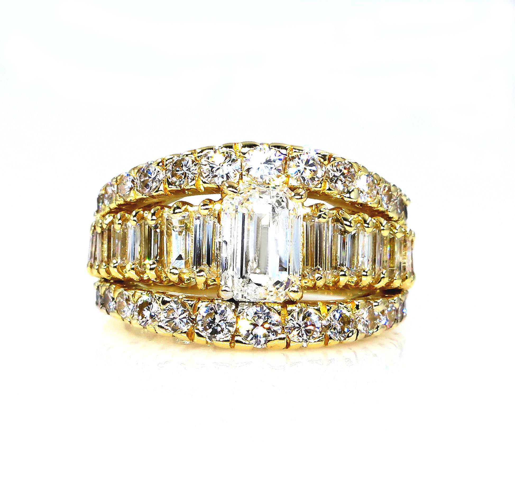 This dramatic and dynamic, uniquely Fabulous Vintage Estate Ring explodes in a blaze of bright white diamonds weighing approx. 4.00 carats total with gorgeous 1.20ct Emerald cut diamond in the center.
The center diamond accompanied by GIA Diamond