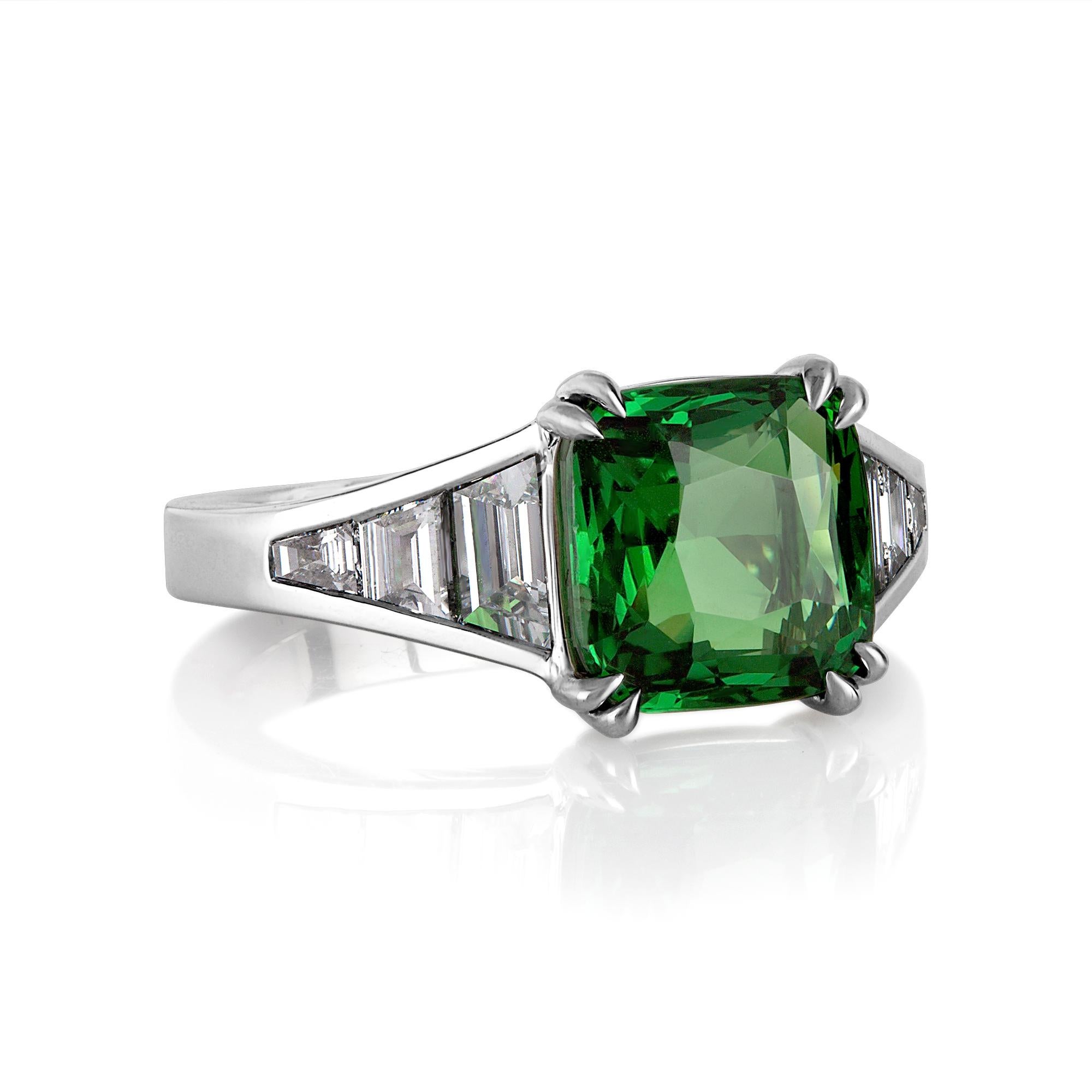 Estate Vintage Rare GIA 4ctw Vivid Green Tsavorite and Trapezoid Diamonds Platinum Ring.

Tsavorite has all of the qualities you want in a gemstone: beauty, rarity, intrinsic value, and romance. With its natural, fresh green color and scintillating