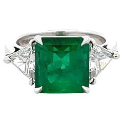 Gia 4.10 Carats Colombian Emerald Diamond Three Stone Ring