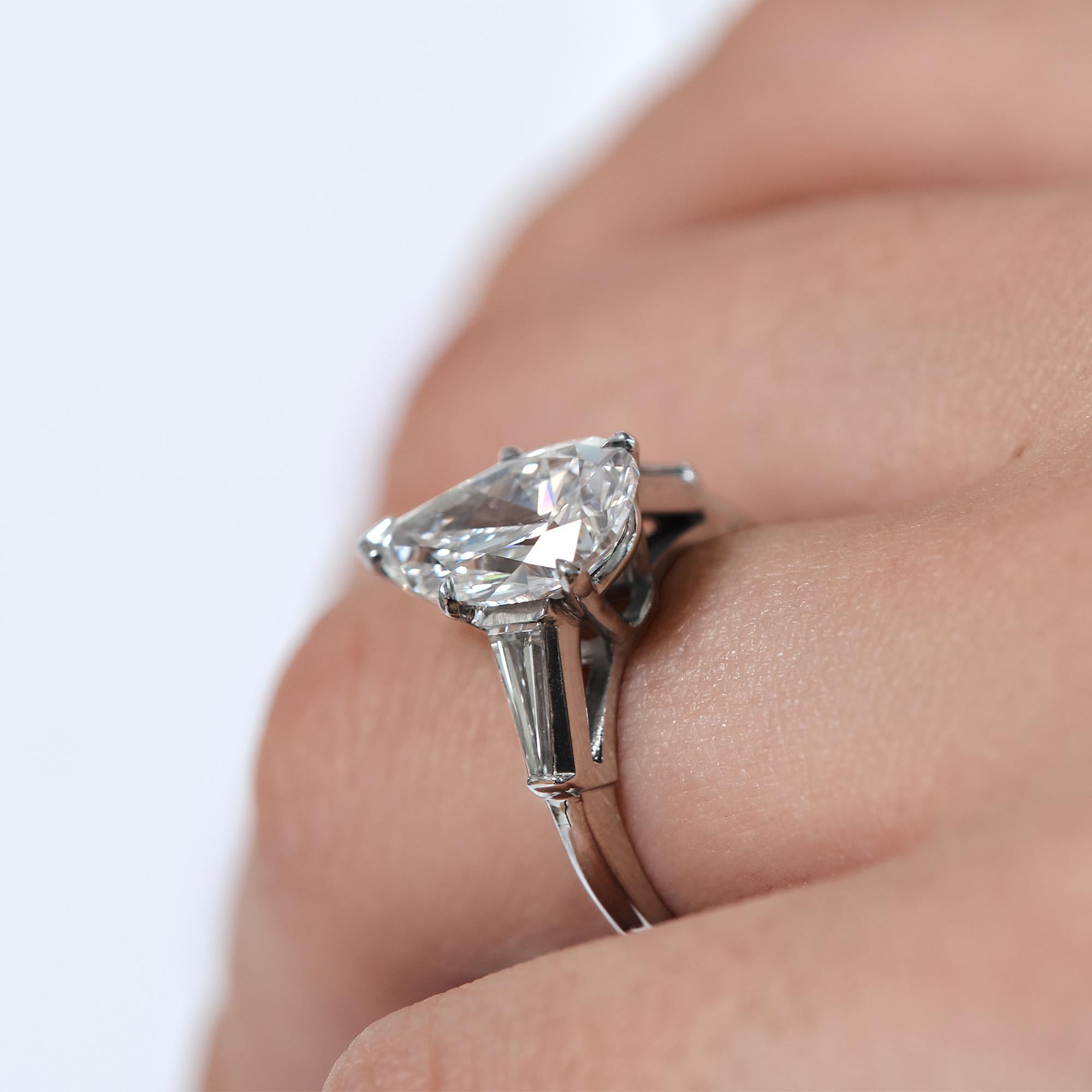 GIA 4.14 Carat Estate Vintage Pear Shaped Three-Stone Diamond Platinum Ring 4