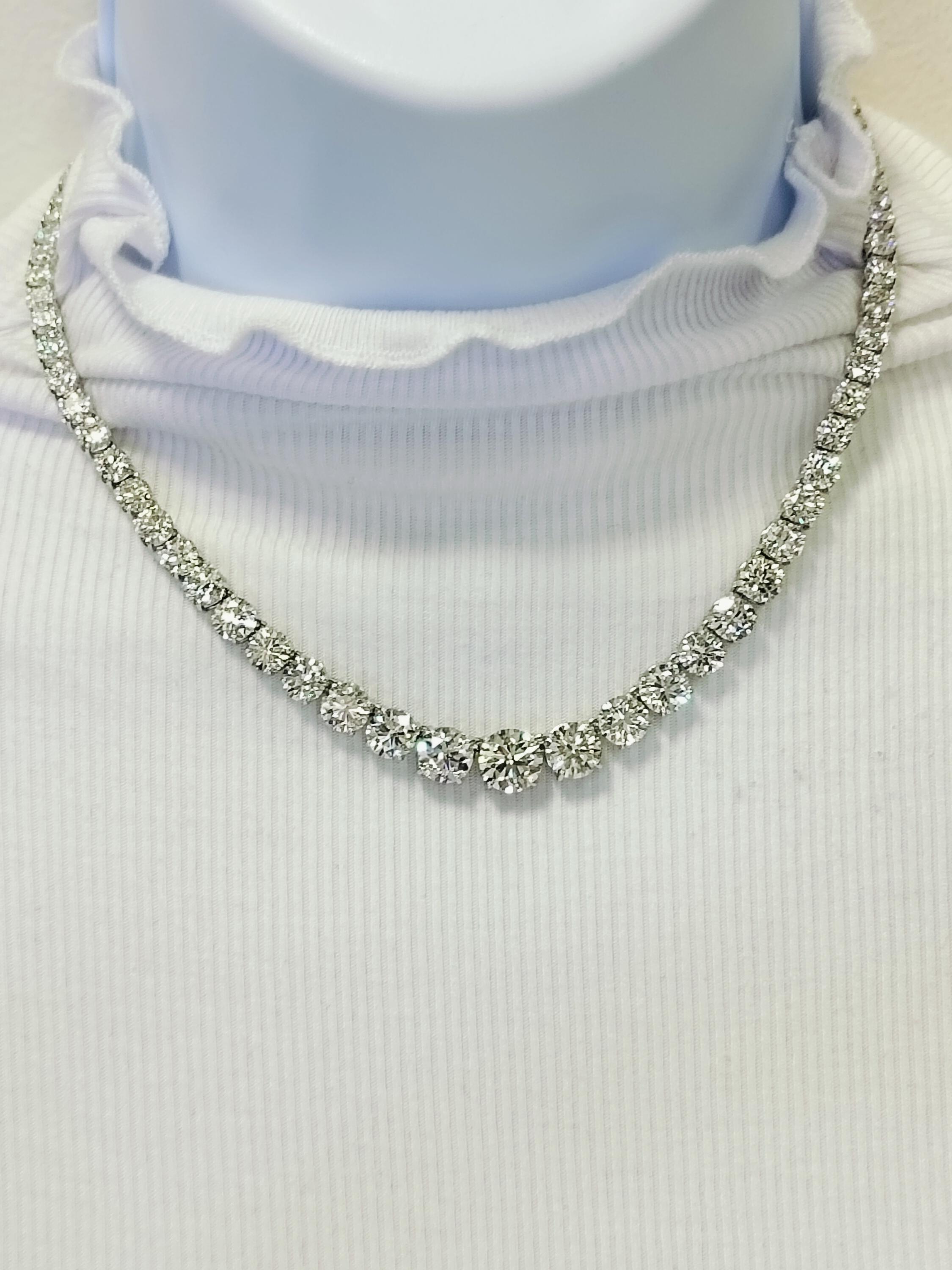 Absolutely stunning riviera featuring 41.82 ct. IJ VS1-SI2 white diamond rounds.  Total of 75 stones.  Each stone has a GIA certificate.  Length is 15