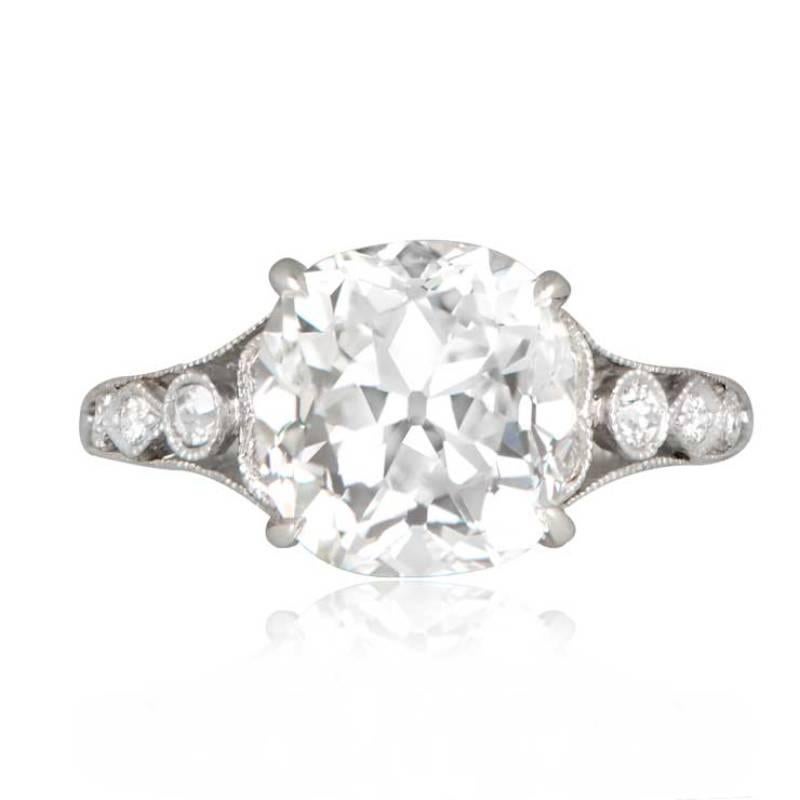 GIA-certified 4.24-carat Antique cushion cut diamond ring, G color, VS2 clarity, with old-cut diamonds along platinum shoulders. Edwardian style with milgrain detail.

Ring Size: 6.5 US, Resizable
Certification: GIA Certified
Color: G Color
Clarity: