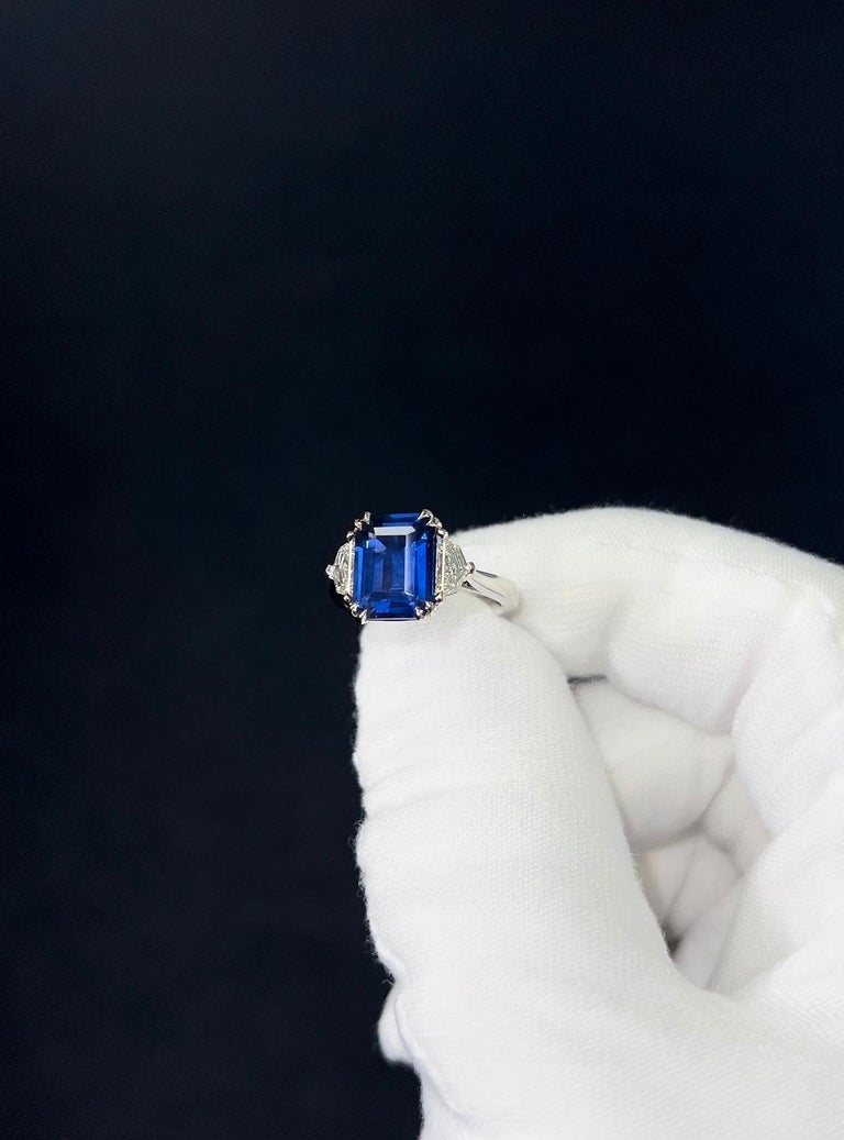 Gorgeous 4.38 Carat GIA Certified Emerald Cut Fine Ceylon Sapphire Ring with an elegant elongated proportion & 0.63ctw F/G VS Epaulette shaped side stones.  

Set in an Expertly Crafted Platinum Comfort Fit Setting. 

Ring Size 6.5