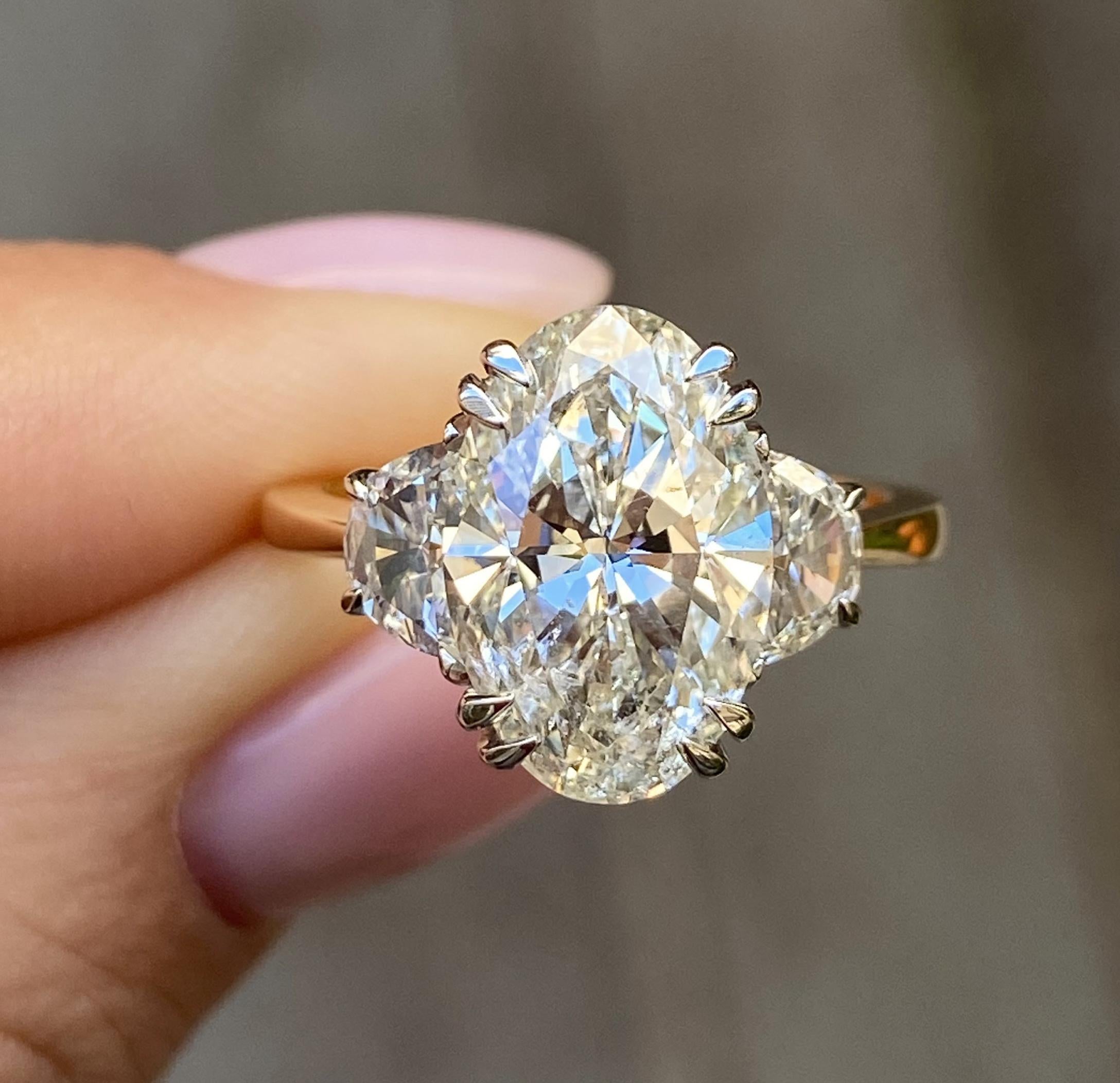 oval diamond 3 stone ring