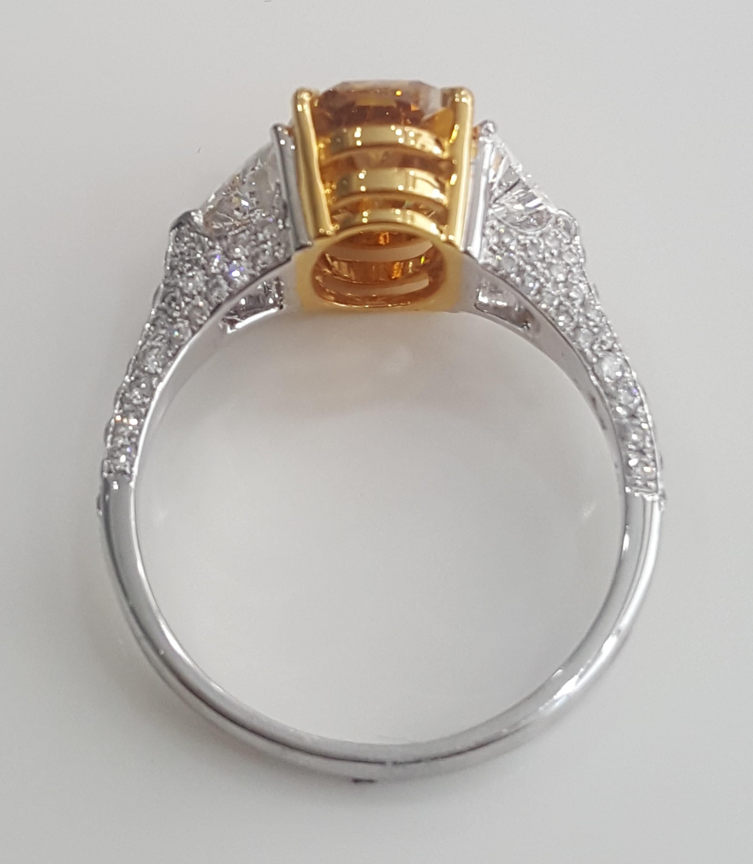 Oval Cut GIA 4.43 Carat Natural Fancy Deep Orange Yellow Oval And White Diamond Ring.  For Sale