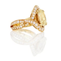 GIA 4.47 Carat Oval Yellow Diamond Ring with 2.36 Cts Colorless Accent Diamonds